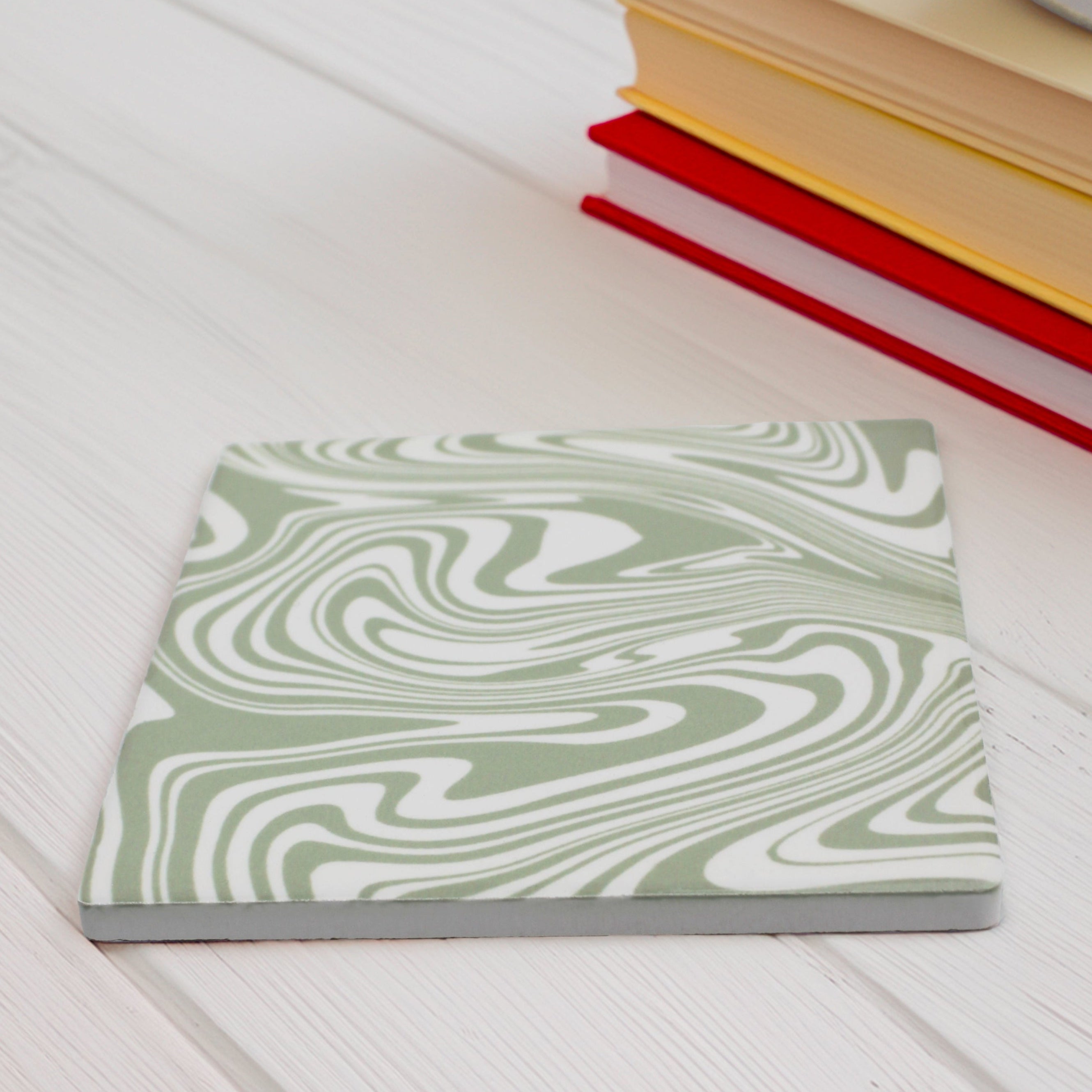 Add a burst of personality to your space with our Funky Swirl Abstract Ceramic Modern Coaster Set. Featuring vibrant, playful swirling patterns, these coasters are designed to liven up any room. Choose from blue, orange, sage green, or yellow. Want a unique combination? You can mix and match up to four colours, just specify your choices and how many of each.
Available in matte or gloss finish to match your style, perfect coaster for coffee