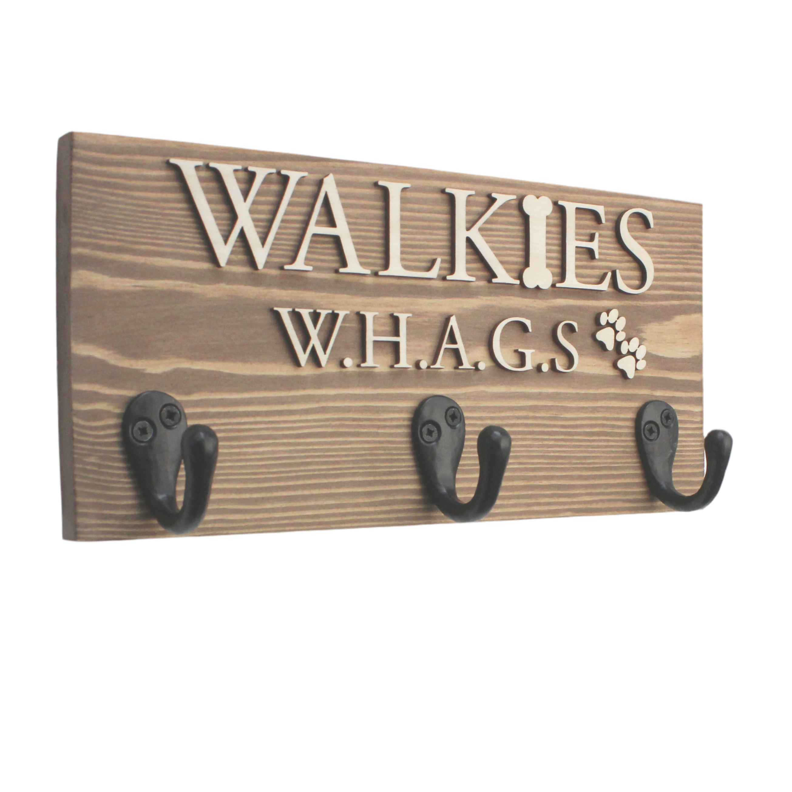 With a rich walnut finish, this personalised dog lead hook brings a touch of elegance to your pet’s corner. Handcrafted from premium wood, it features raised lettering in natural wood or black, showcasing your pet’s name beautifully. Add a paw print for an extra personal touch while keeping your pet’s accessories neat and stylish.