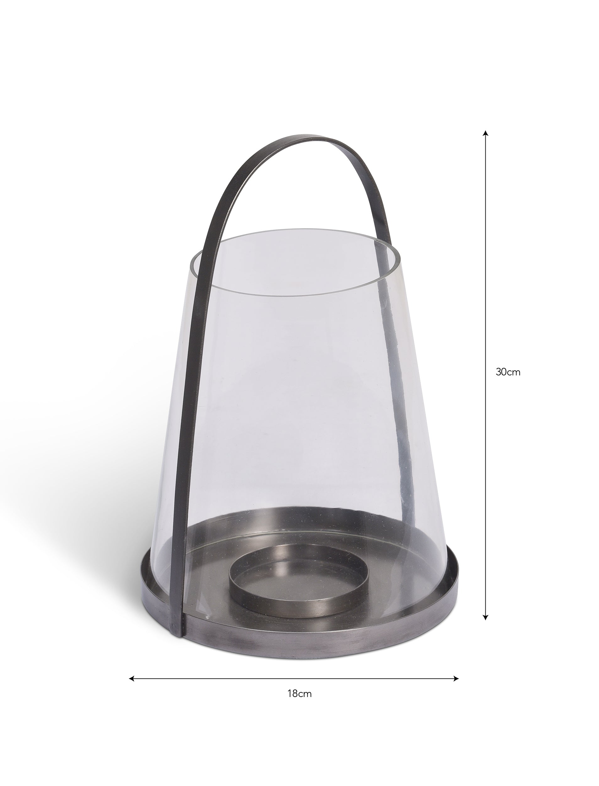 Clear glass lantern with metal base and handle on a white background