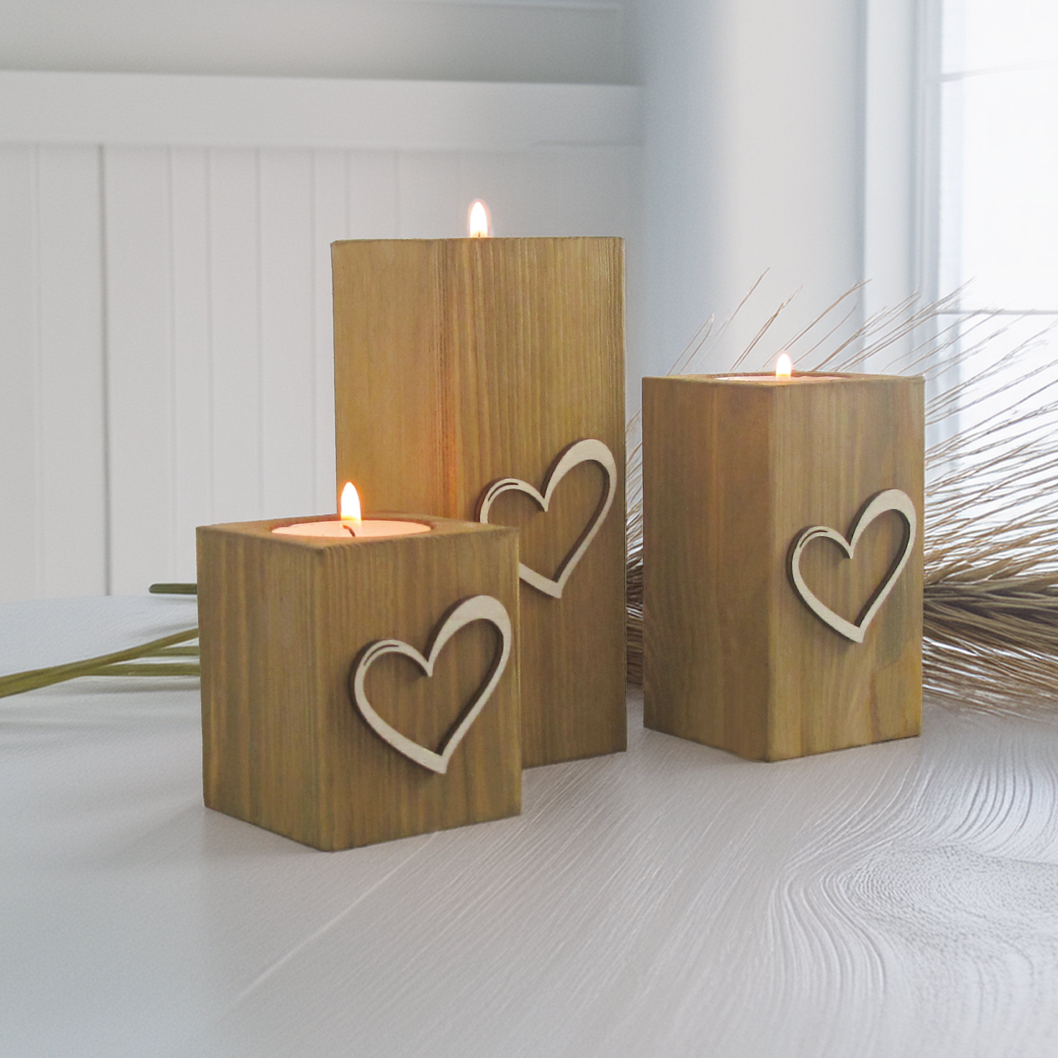 "Charming light oak tea light holder, offering a subtle and warm aesthetic that complements any décor."