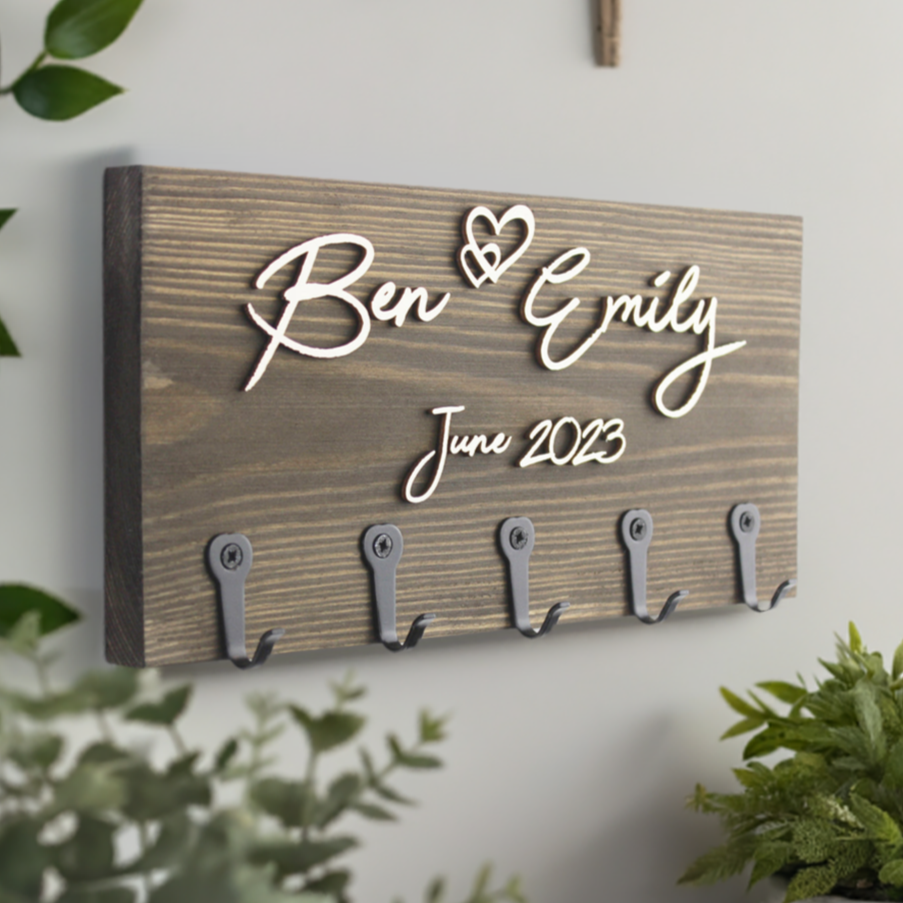 English Oak: "Elegant English oak personalised key holder, featuring a raised design, making it the perfect personalised gift for a new home or a couple."