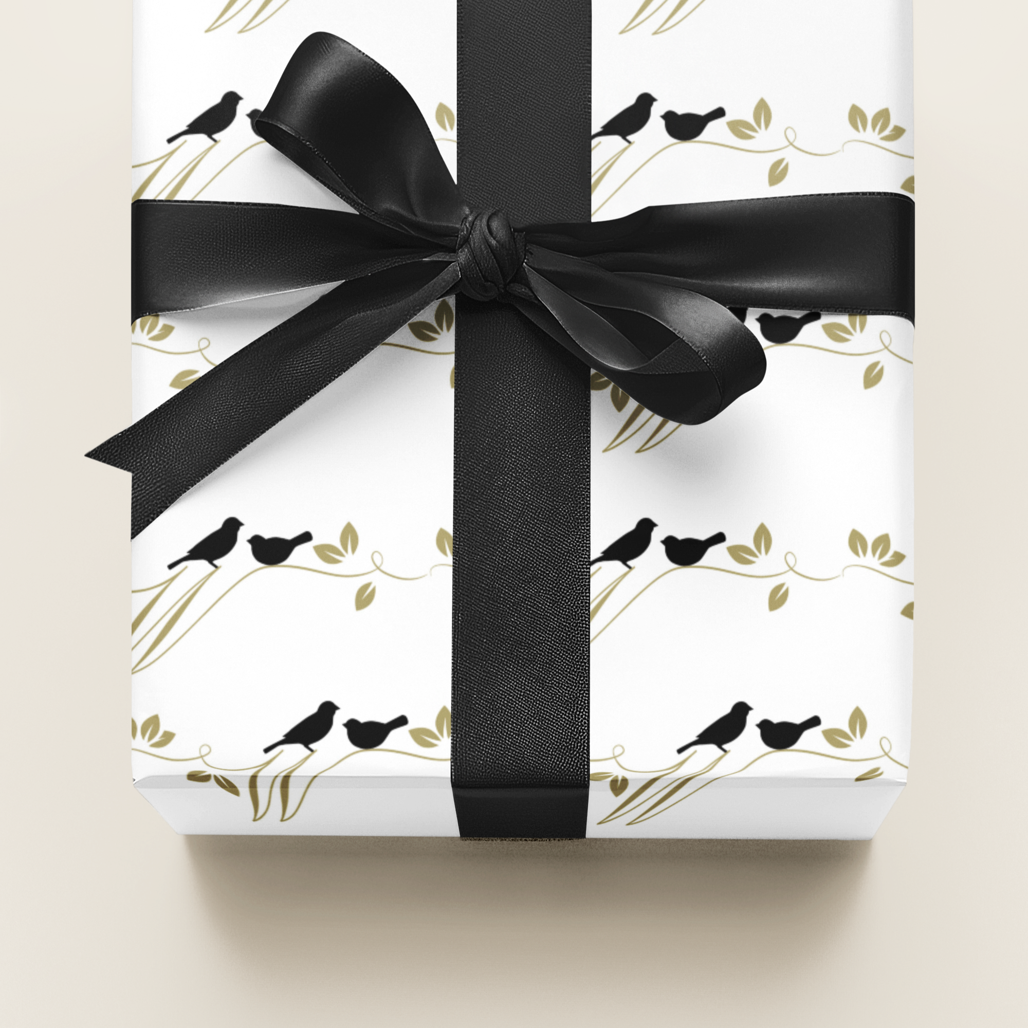 Gift box with black ribbon and bird pattern on white background