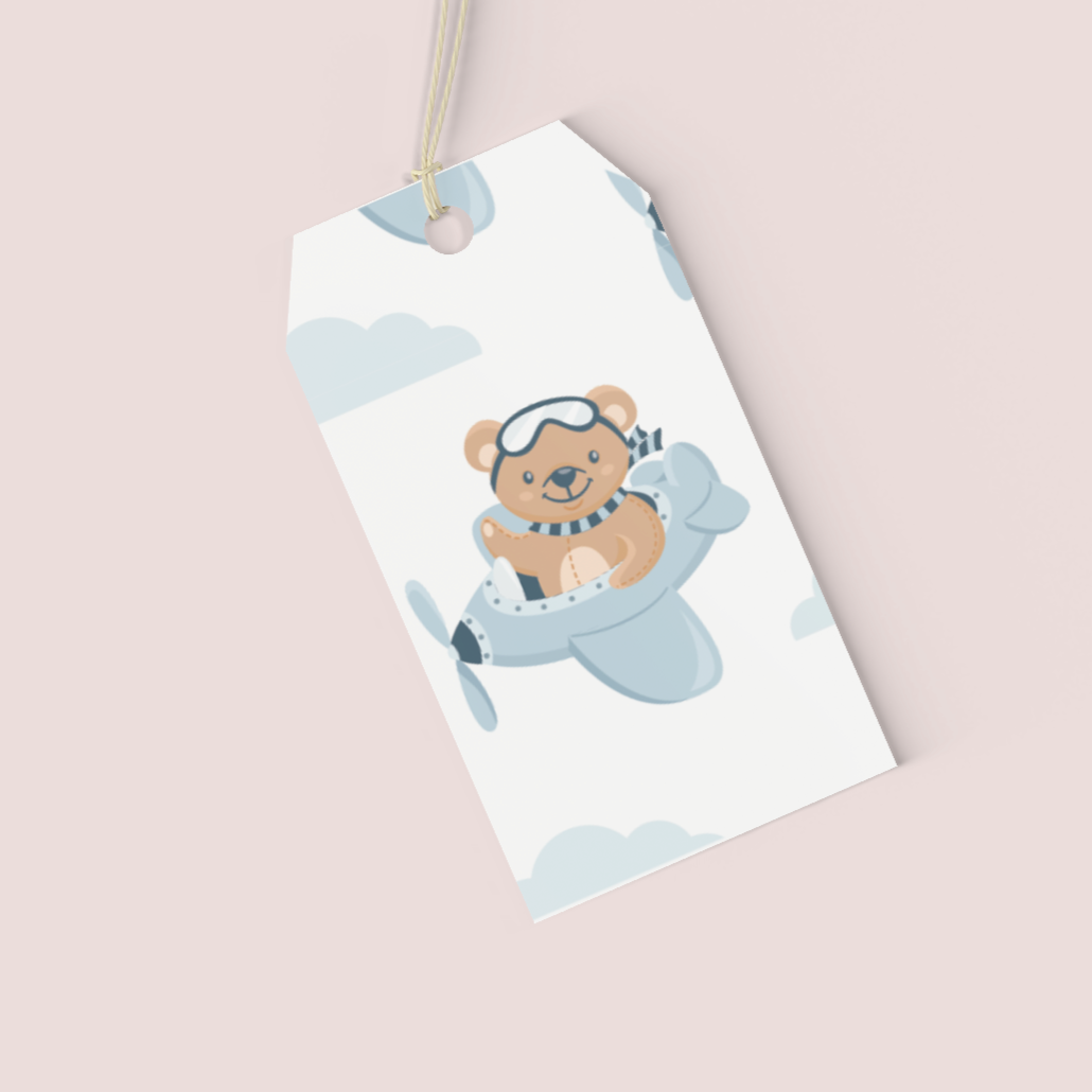 Gift tag with a bear design on a light pink background