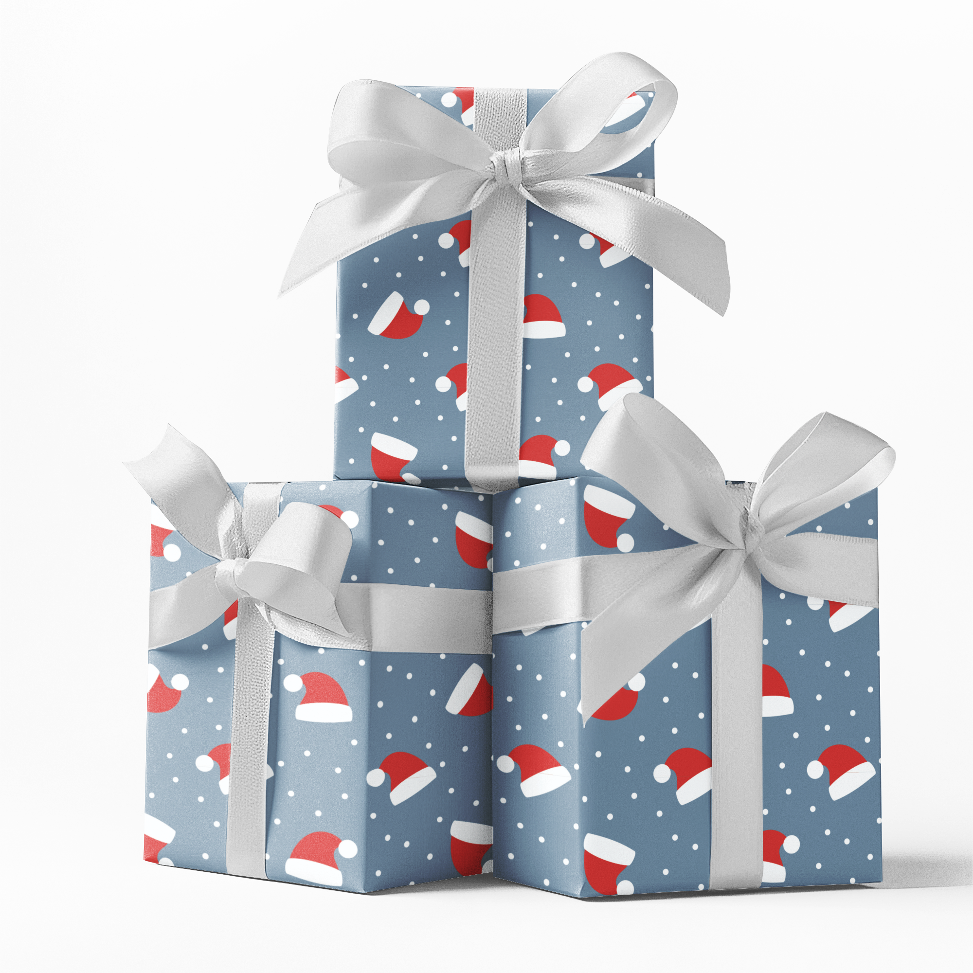 Three stacked gift boxes with blue wrapping paper featuring red and white Santa hats and silver ribbons on a white background.