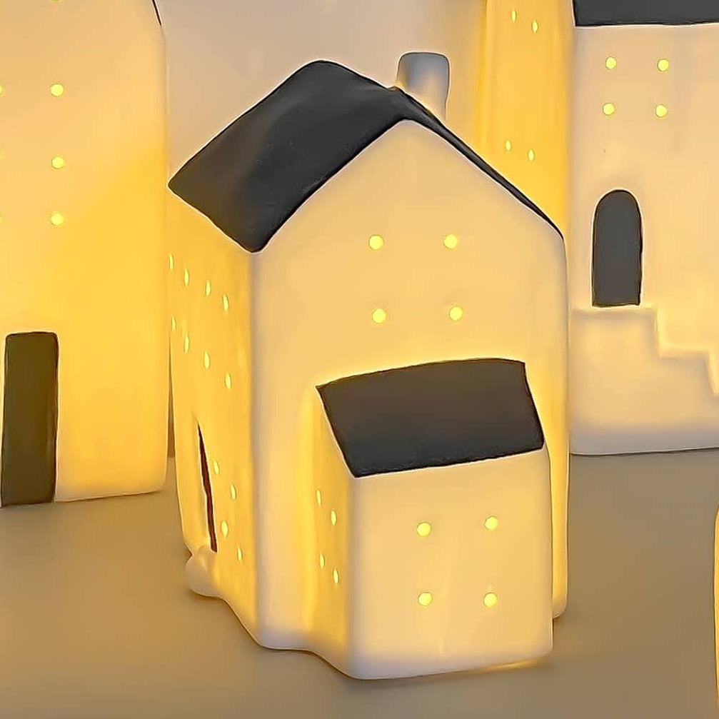 small house-shaped lights on a grey background led light s seasonal decor
