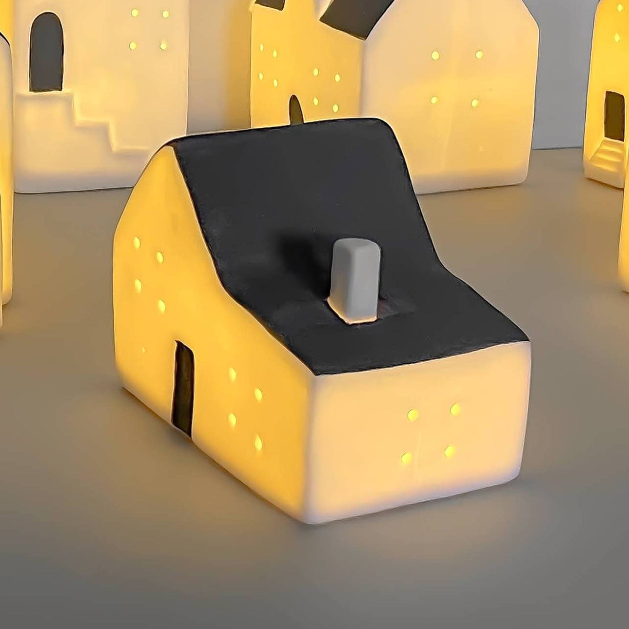 white led house with grey roof Christmas decor