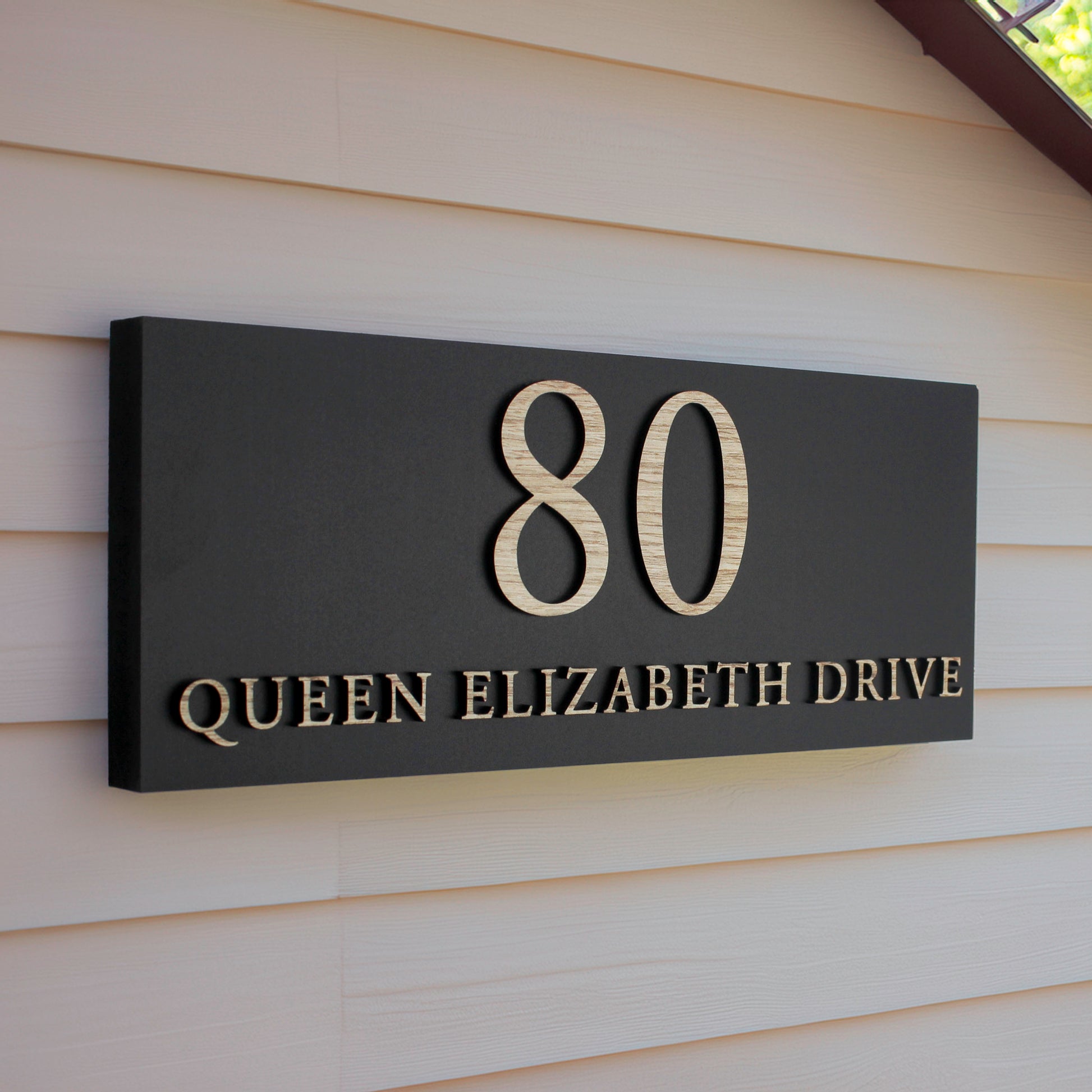 wood effetc raised lettering on our medium size rectangular sign