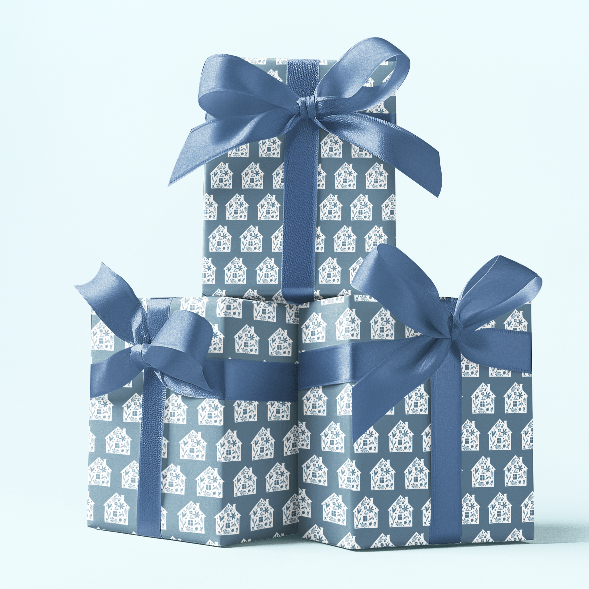 gift wrapping paper with house warming them in dark blue
