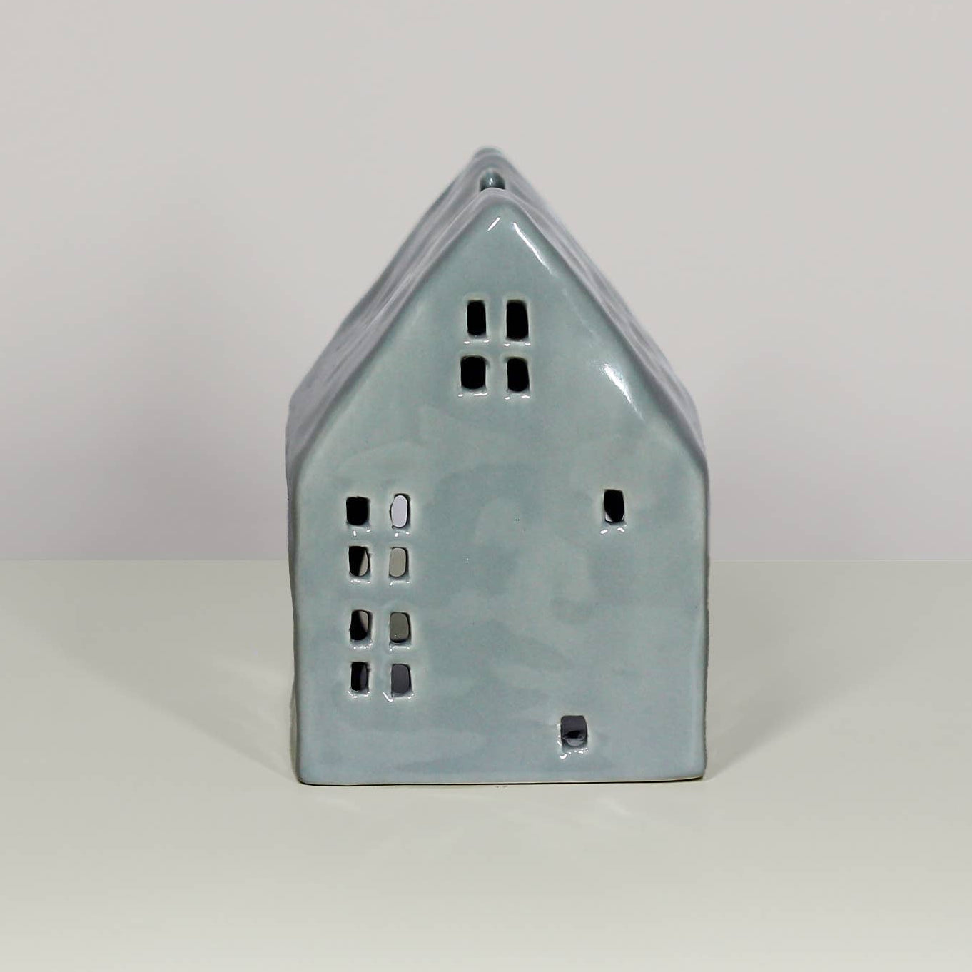 Small house-shaped grey house add a tea light holder