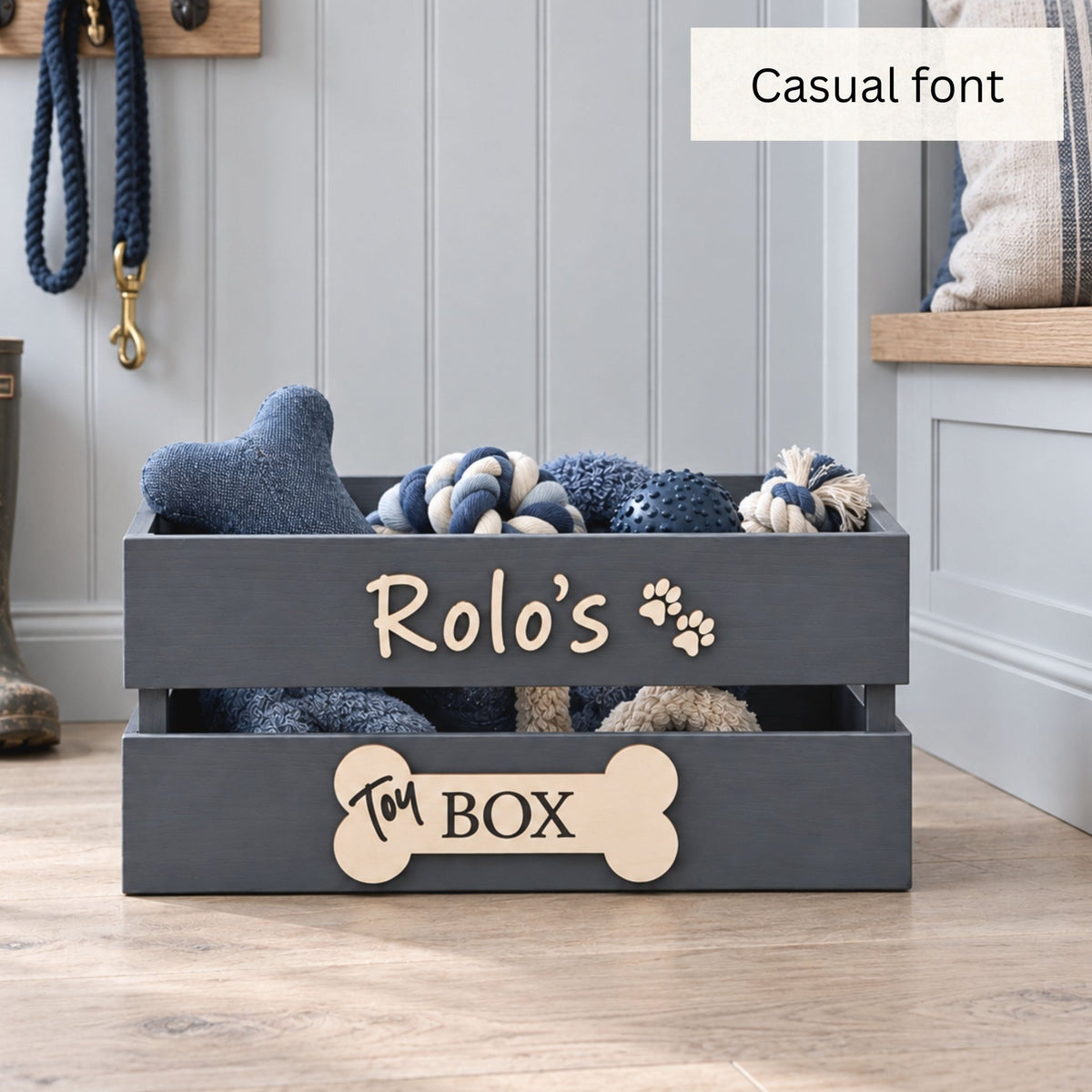 Grey personalised wooden dog toy box with Rolo’s name in casual lettering
