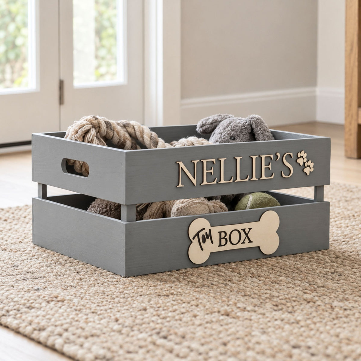 Grey personalised dog toy box styled with neutral dog toys