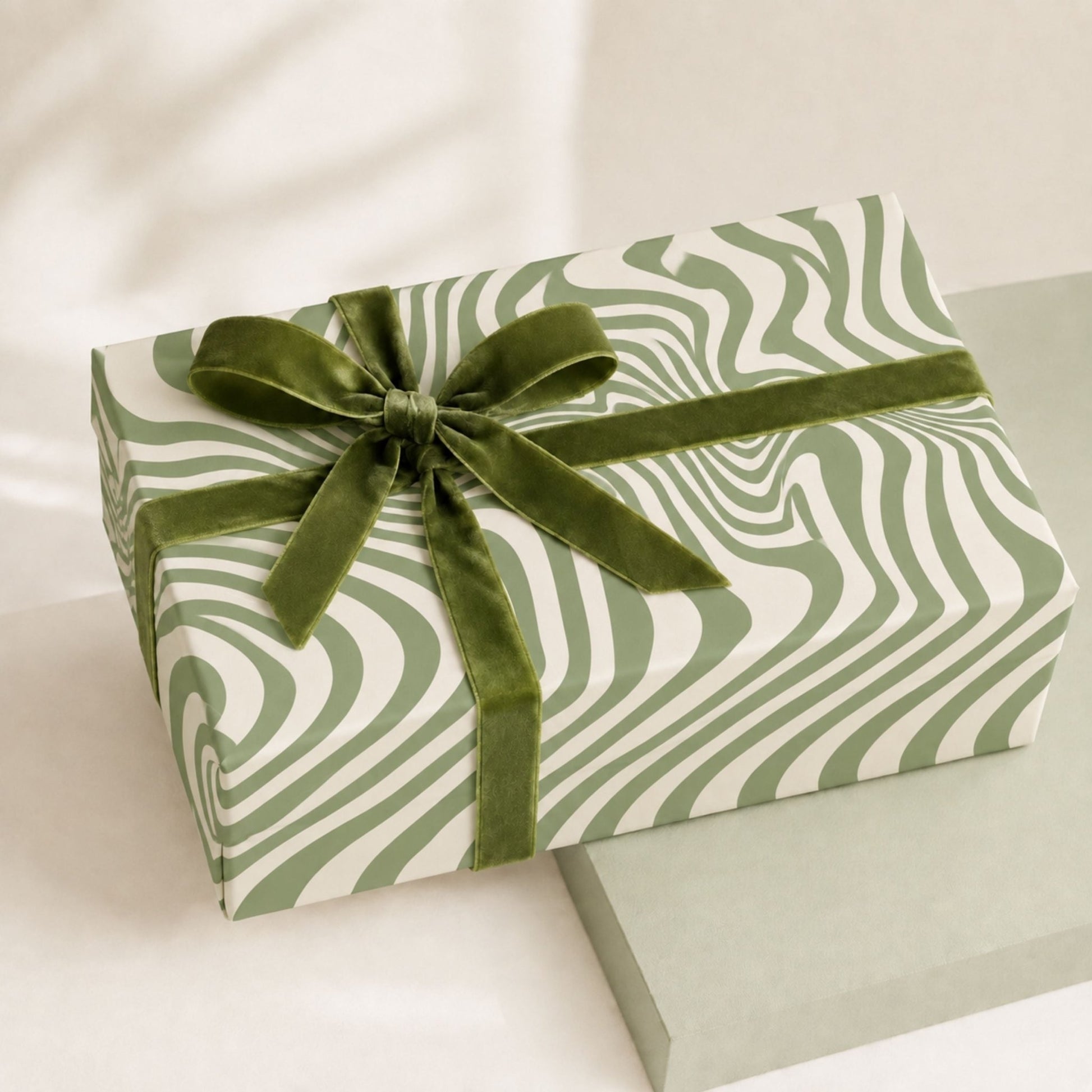 Green Retro Swirl gift wrapped with matching green ribbon
