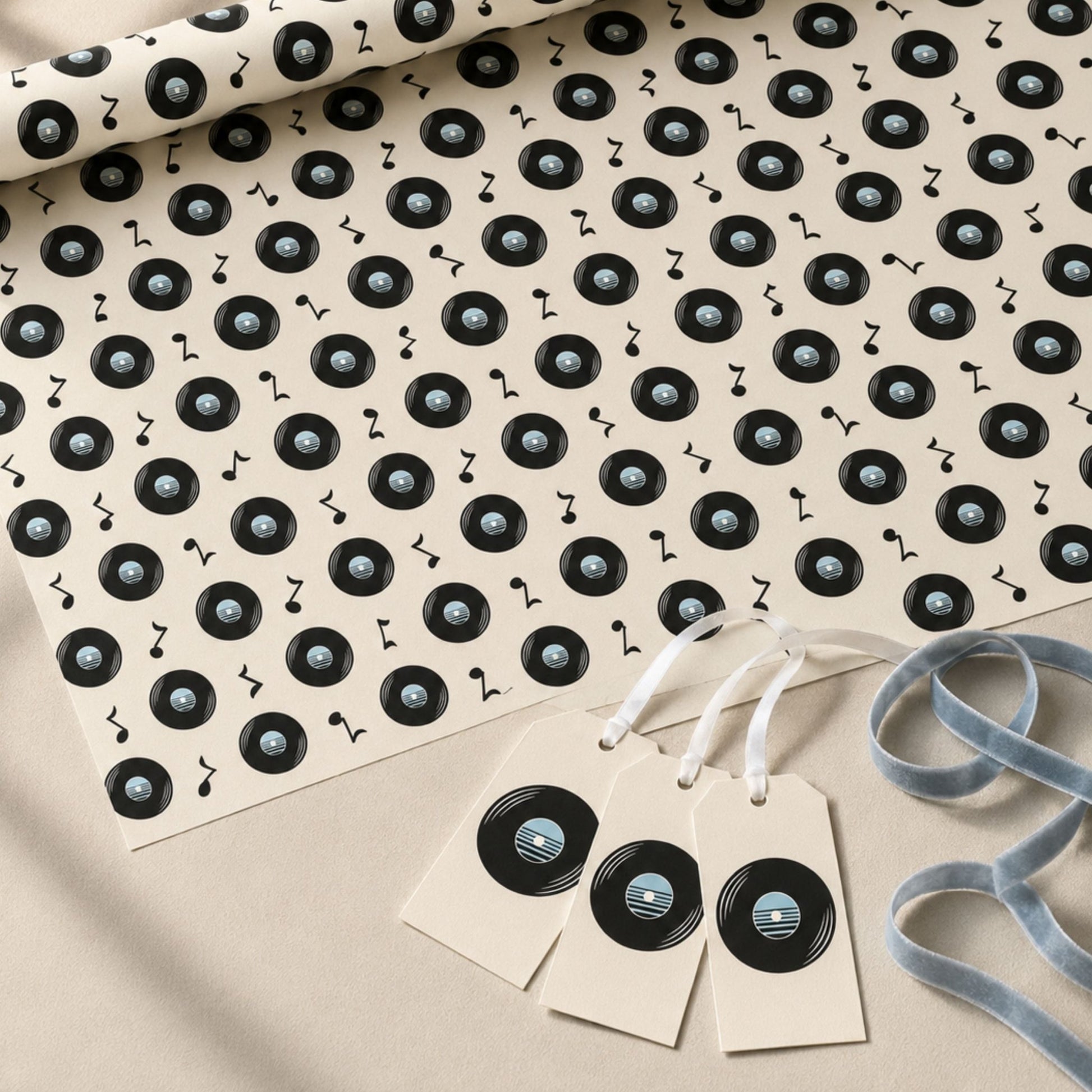 Matching gift tags included with retro vinyl record wrapping paper
