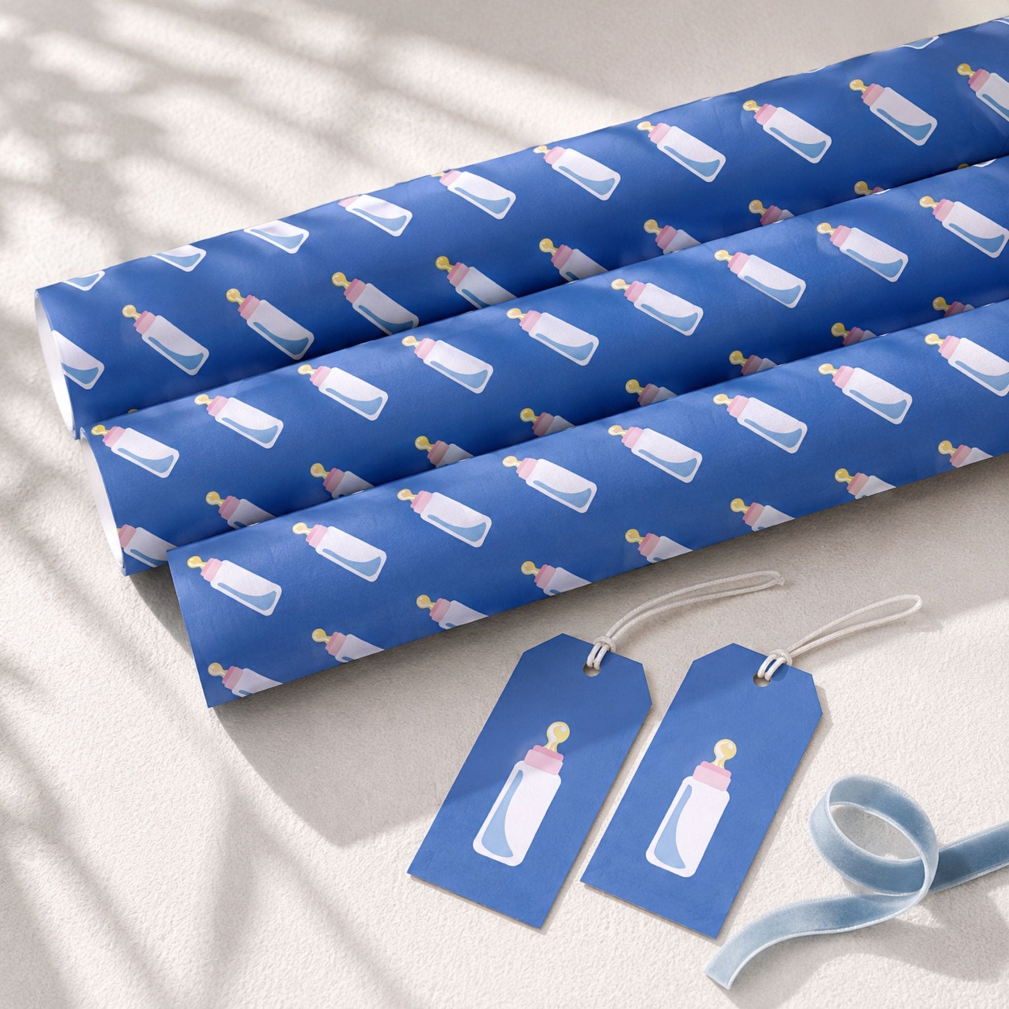 Pink and blue baby bottle gift wrap for new baby and baby shower gifts