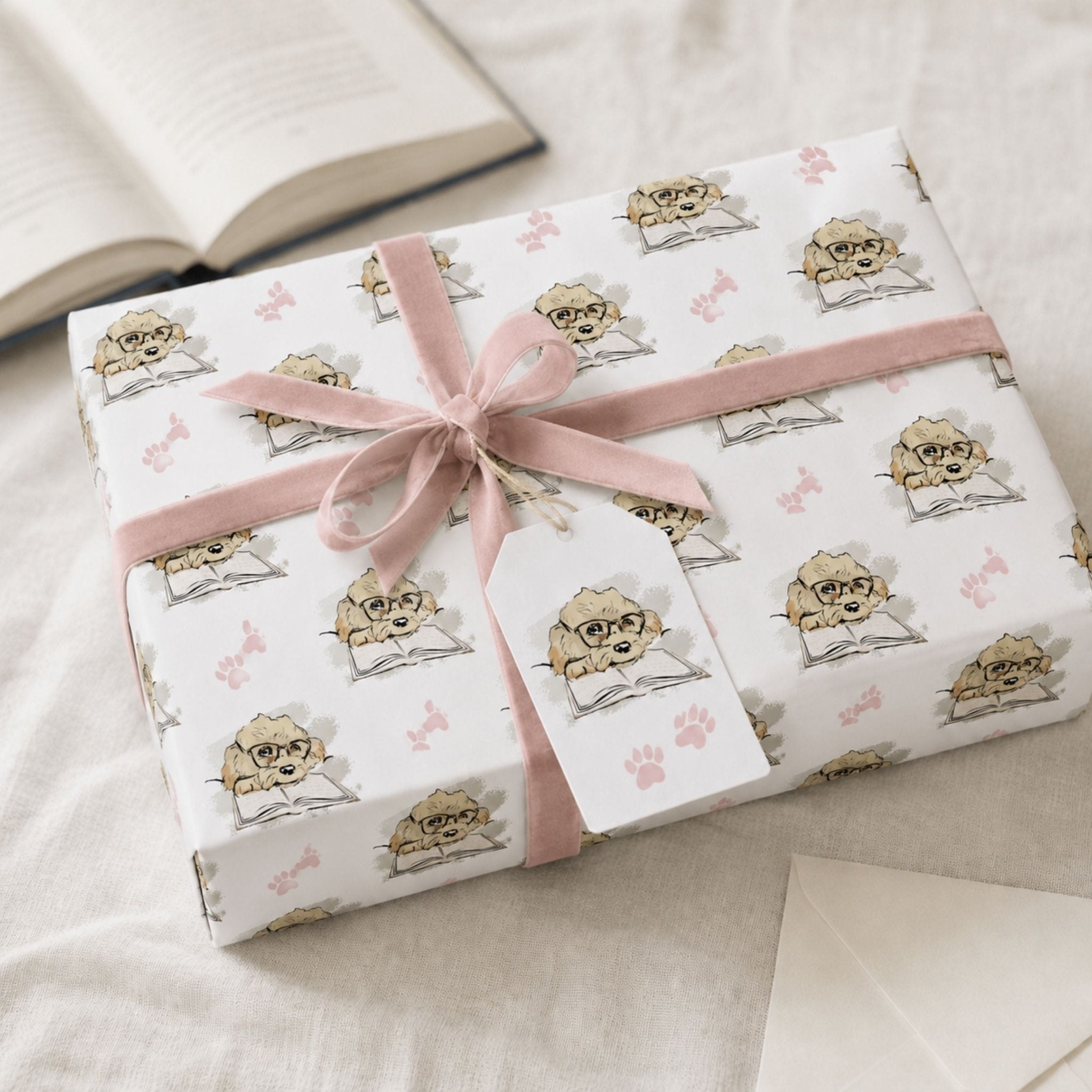 Dog lover gift wrapped in Cavapoo wrapping paper with soft pink ribbon and paw print design
