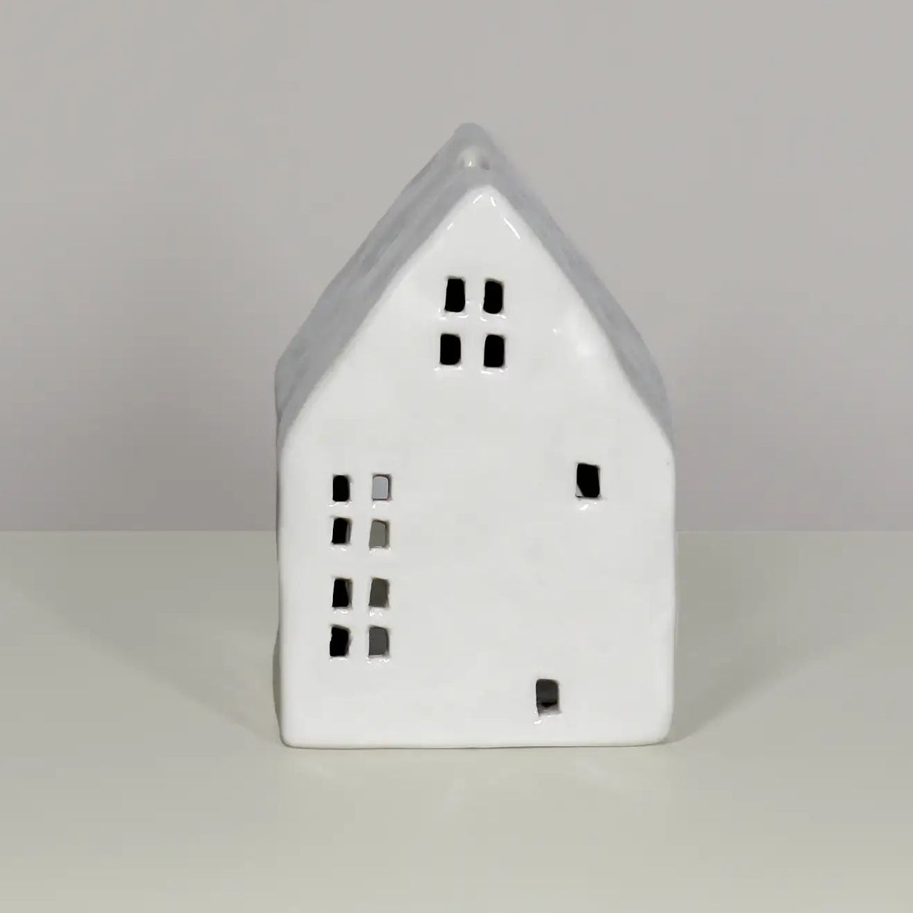 White house-shaped ceramic tea light holder