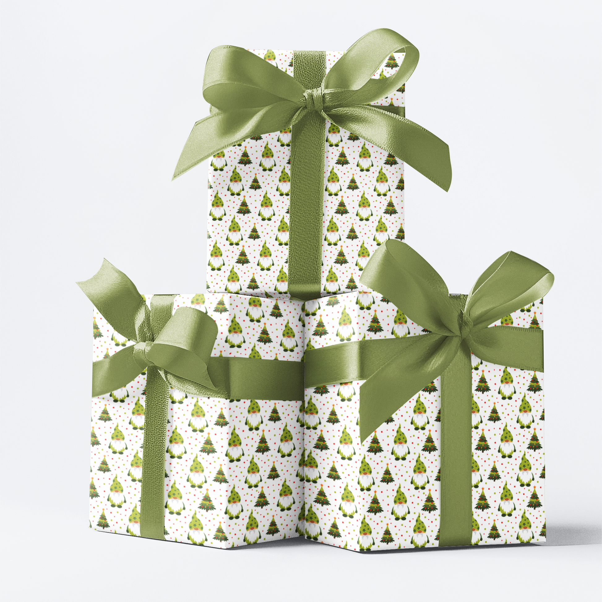 3 boxes wrapped in Ghristmas gonk design bright green and festive
