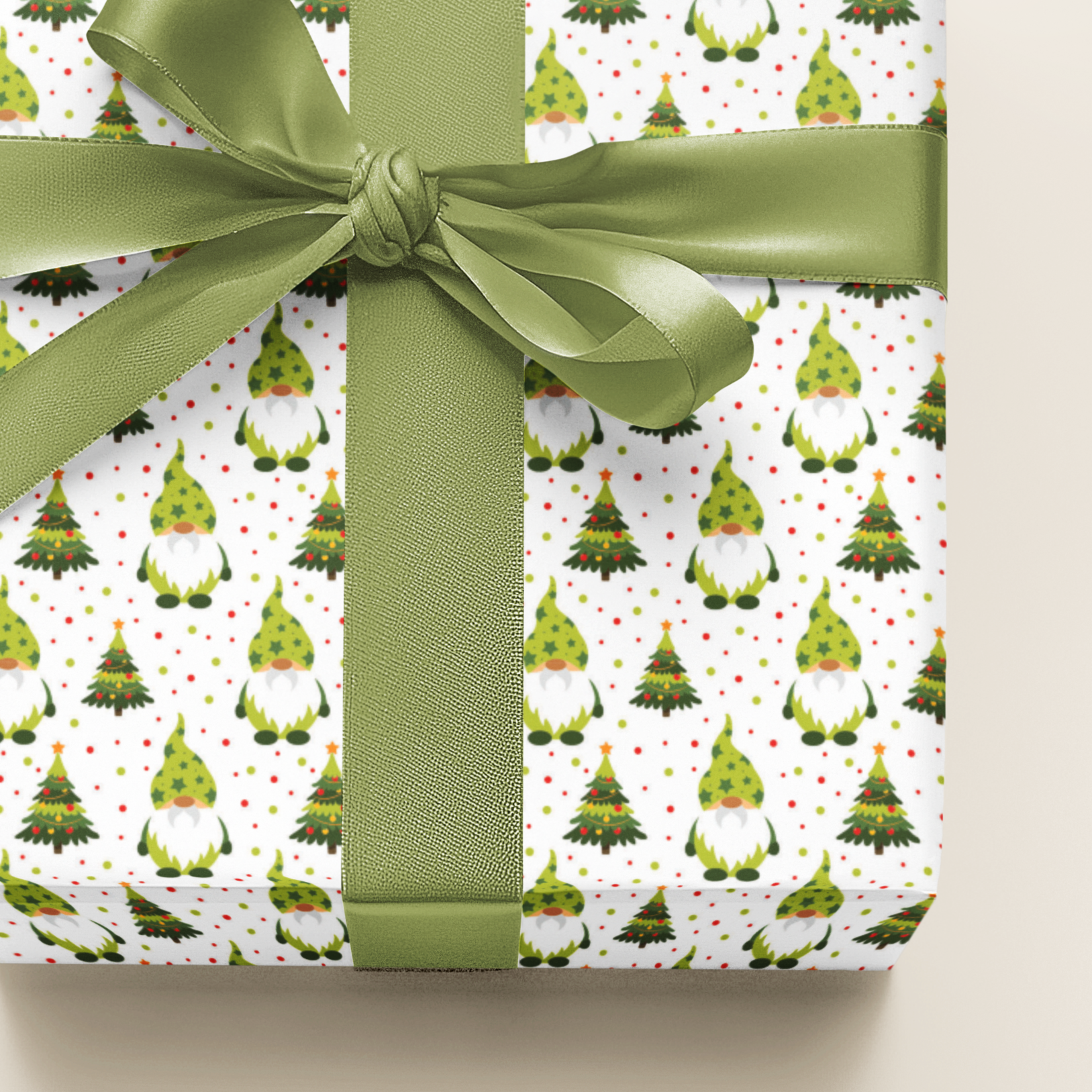 Gift wrapped in paper with Christmas gnomes pattern and green ribbon on a beige background