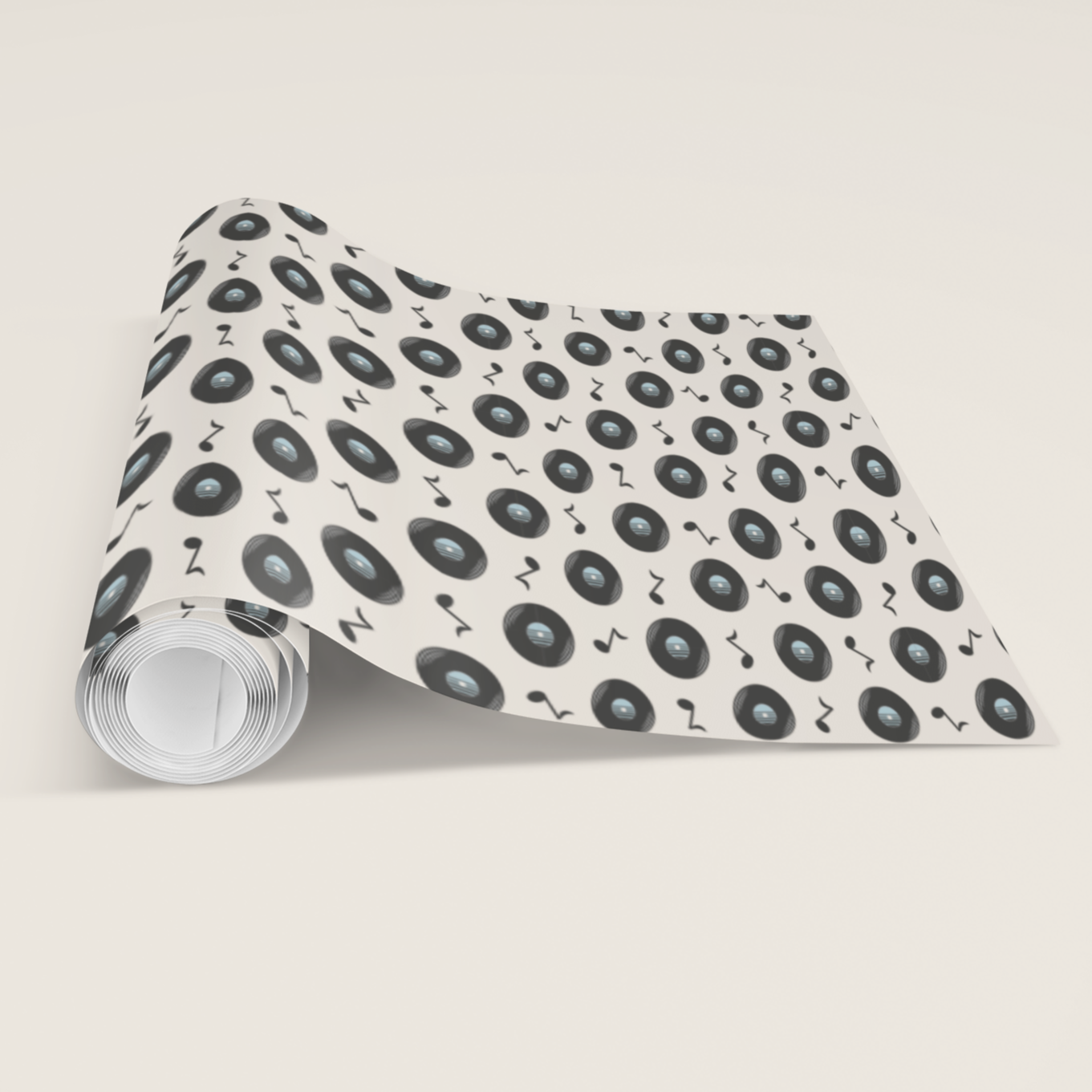 Roll of gift wrapping paper with a black vinyl record pattern perfect gift for him