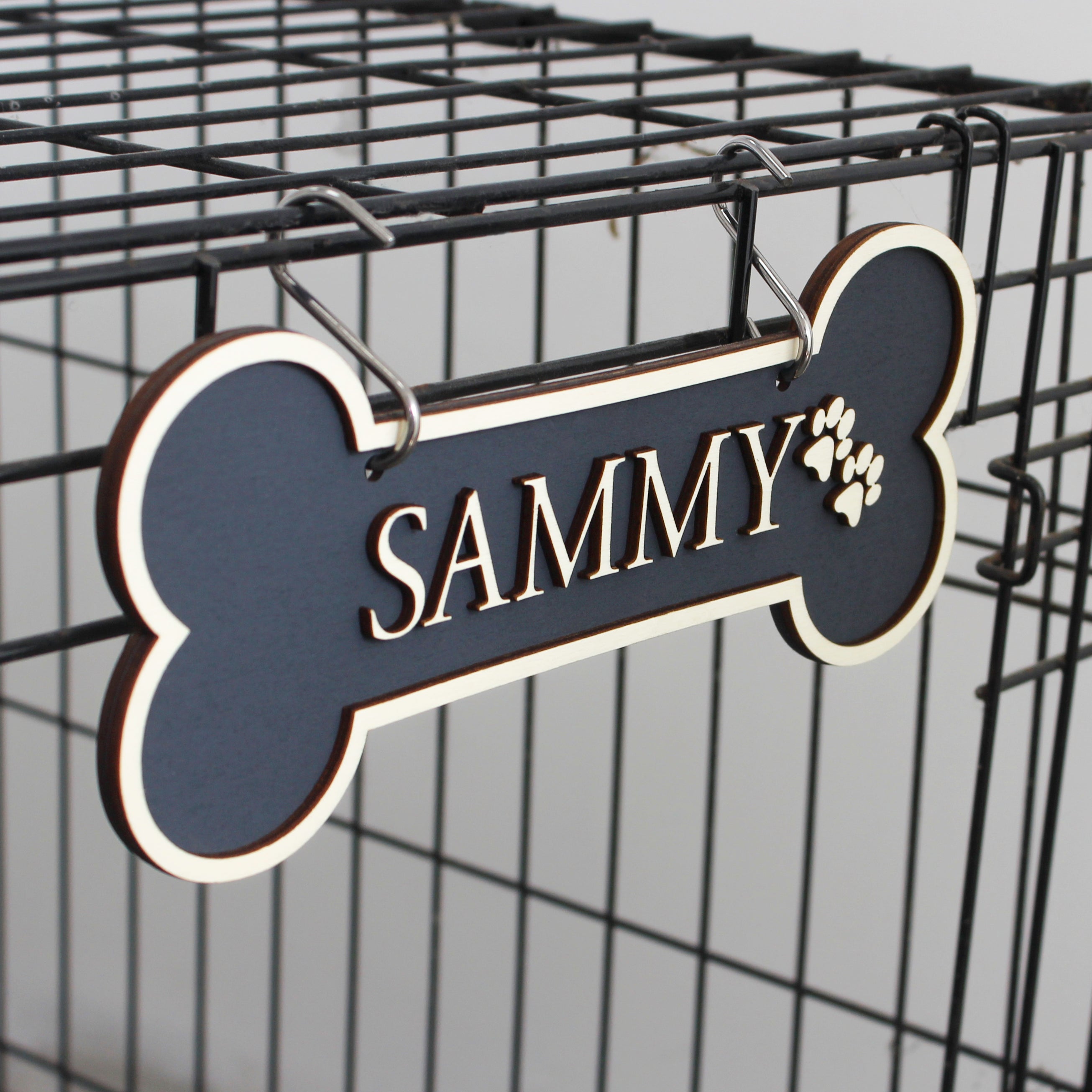 Personalised dog bone crate signs with pre-drilled holes and hooks
