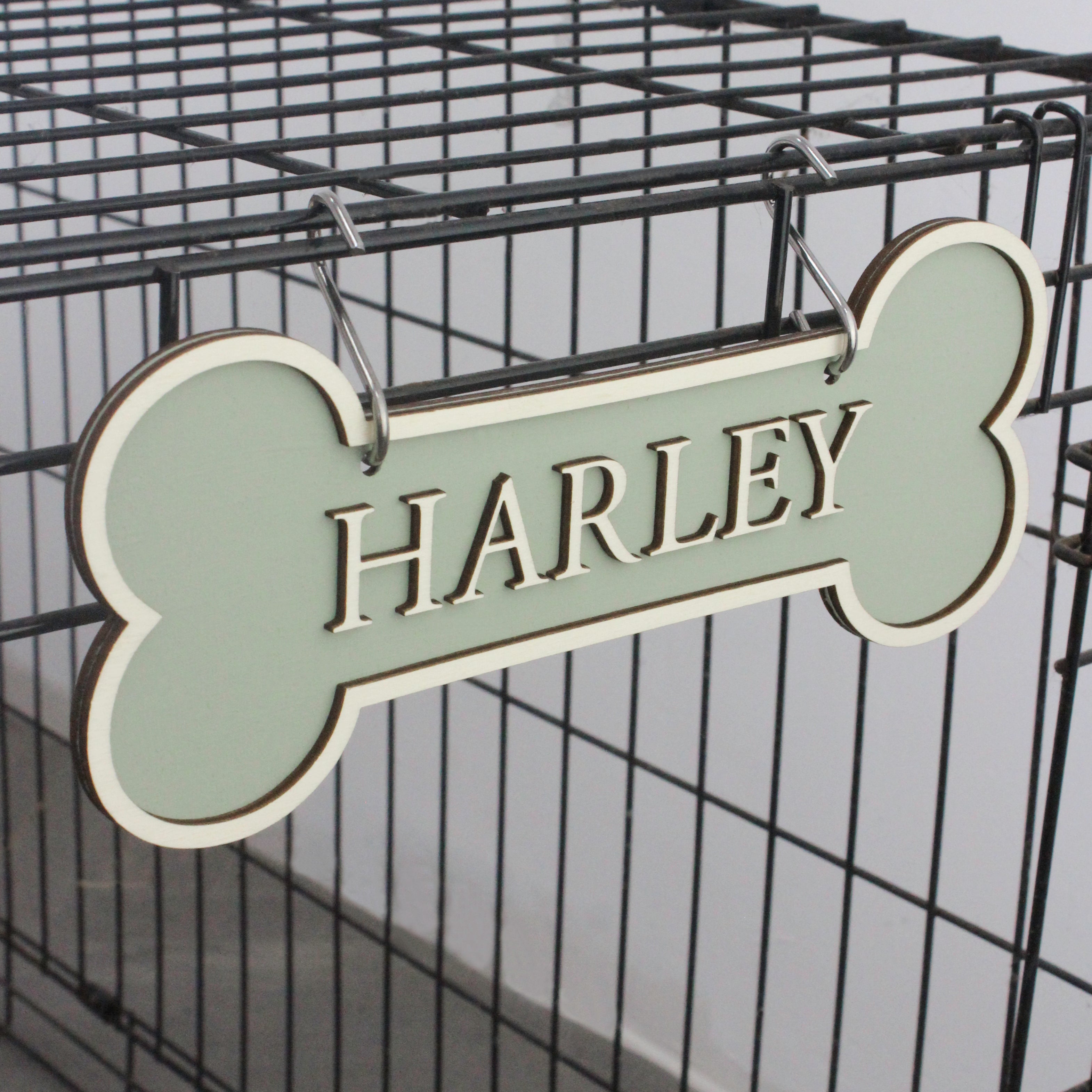 Personalised dog bone crate signs with pre-drilled holes and hooks
