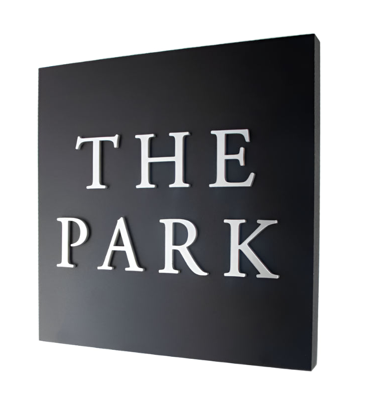 Weather-resistant matte black square house sign featuring silver raised text for a stylish and easy-to-read display.