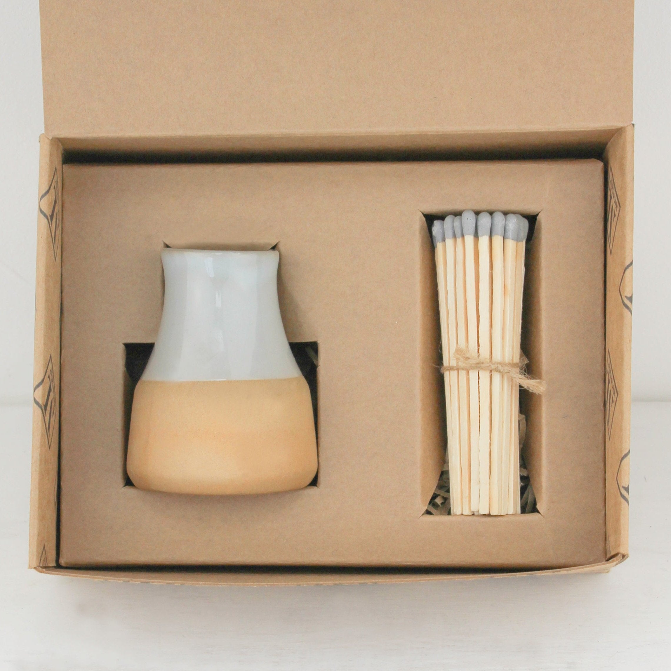 "Beautifully glazed ceramic match pot, designed to store matches and elevate your home décor. Gift wrapping available to make it an ideal gift for any occasion."

Handmade in small batches by skilled artisans in Southern India.

We also offer matchstick refills, so you can keep enjoying it time and time again.
this variant is a grey match stick holder