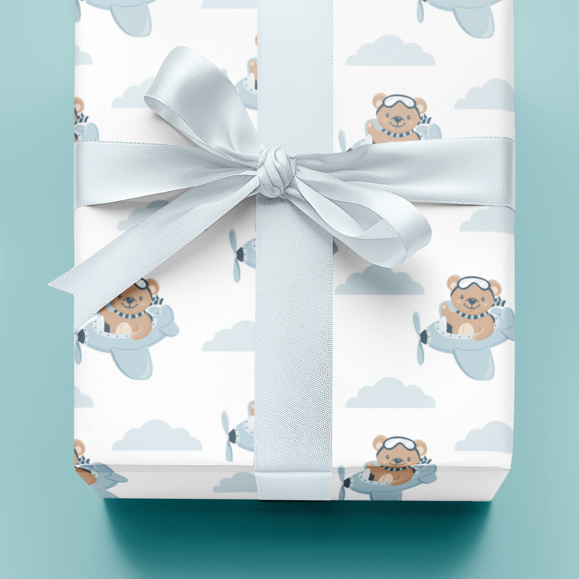 Gift wrapping  paper with teddy bear design on a light blue background, luxuriously thick