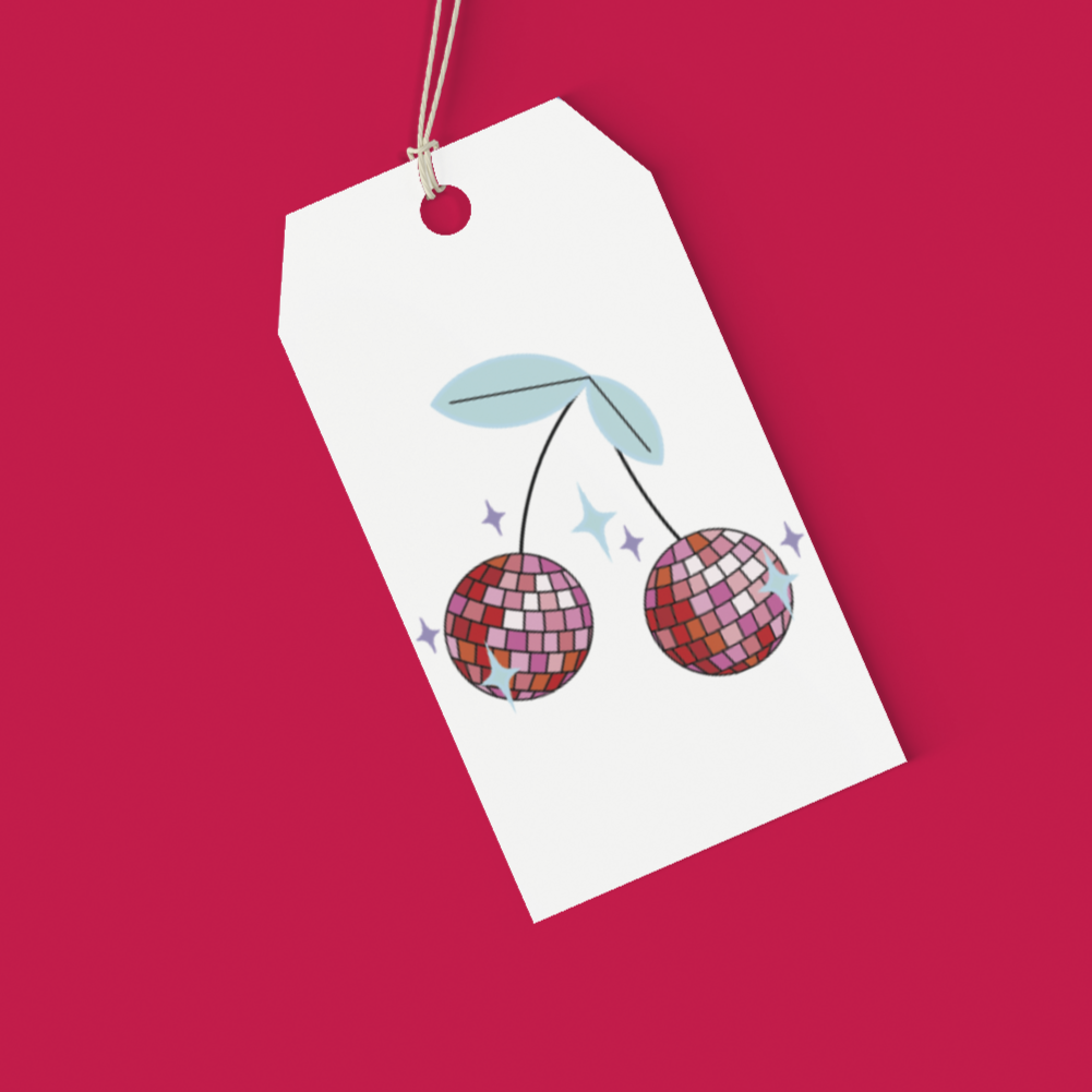 Gift tag with disco ball cherries on a pink background