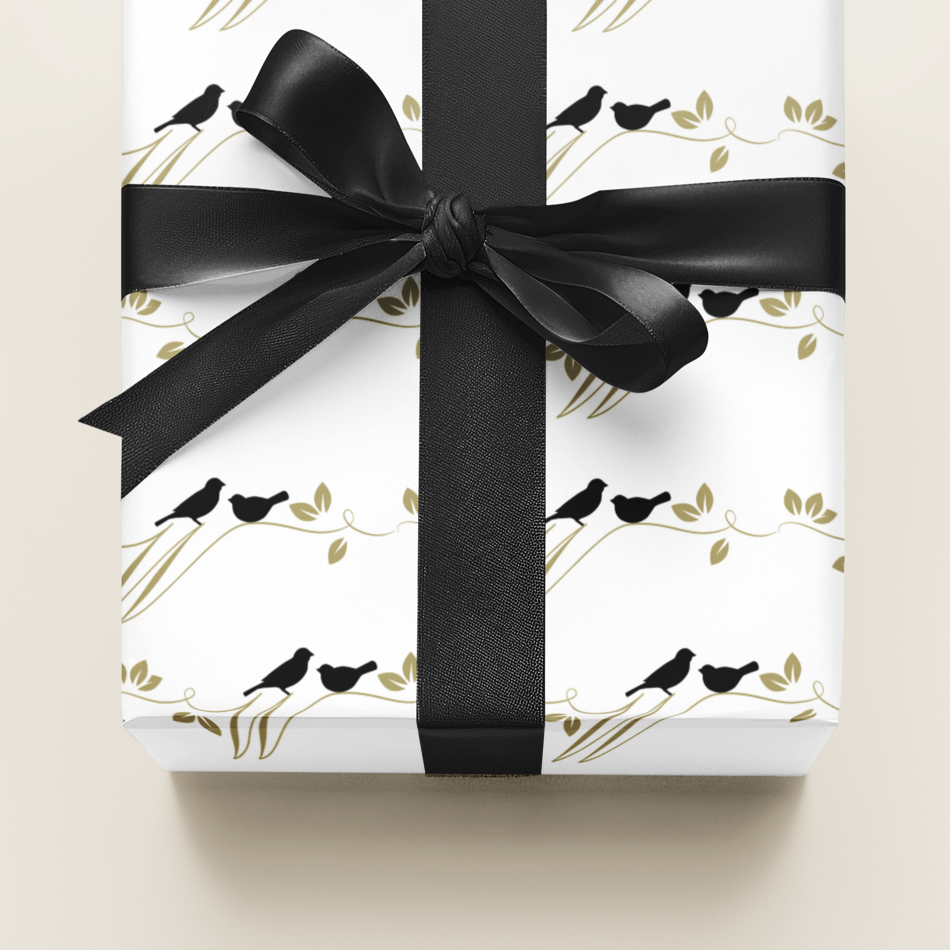 Gift box with black ribbon and bird pattern on white background