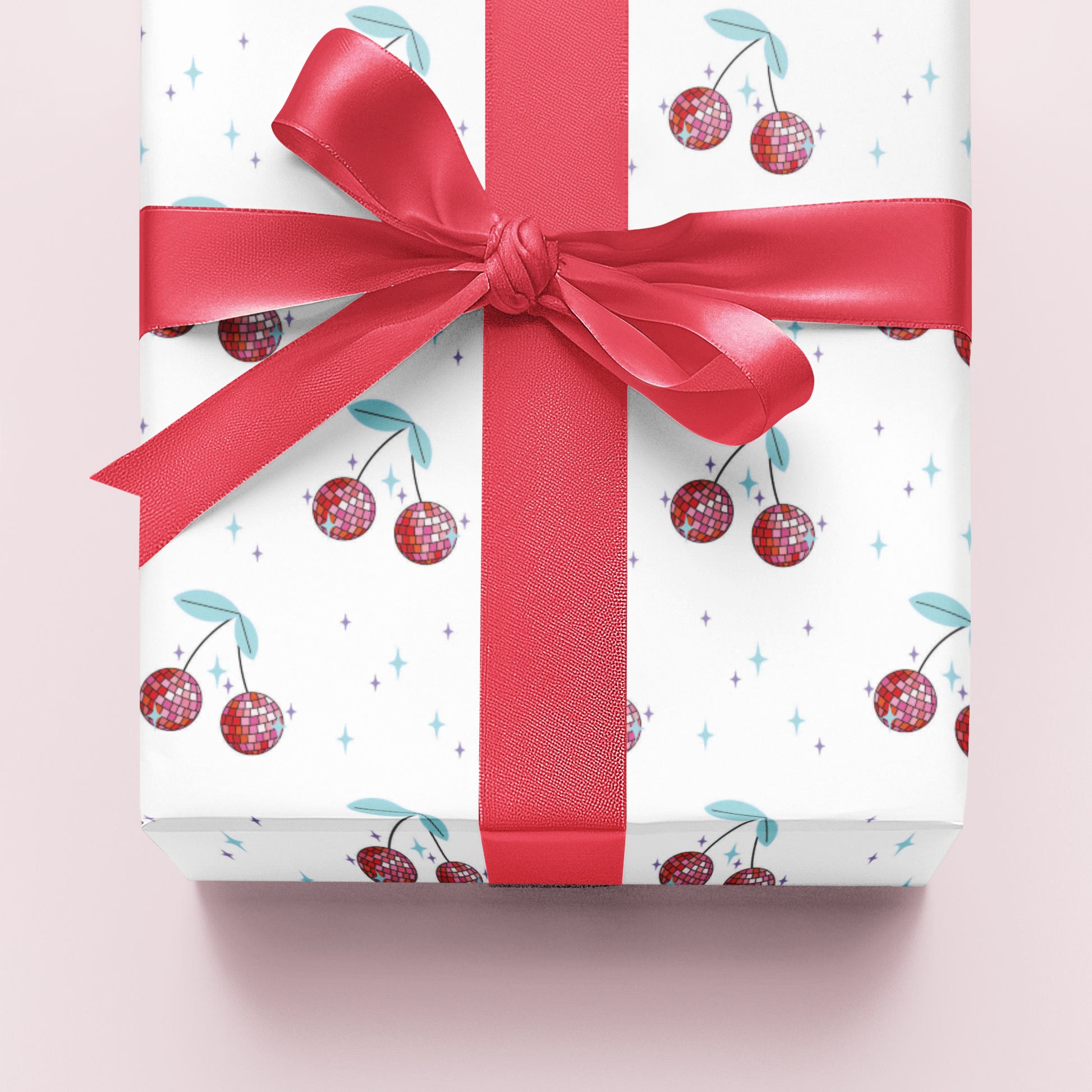 Gift wrapping paper with cherry pattern and red ribbon on a light pink background