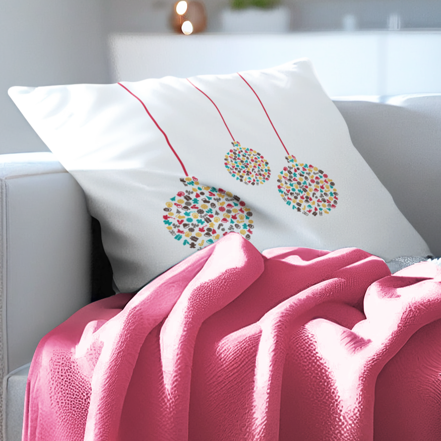 White sofa with pink blanket and decorative pillows in a living room setting.
