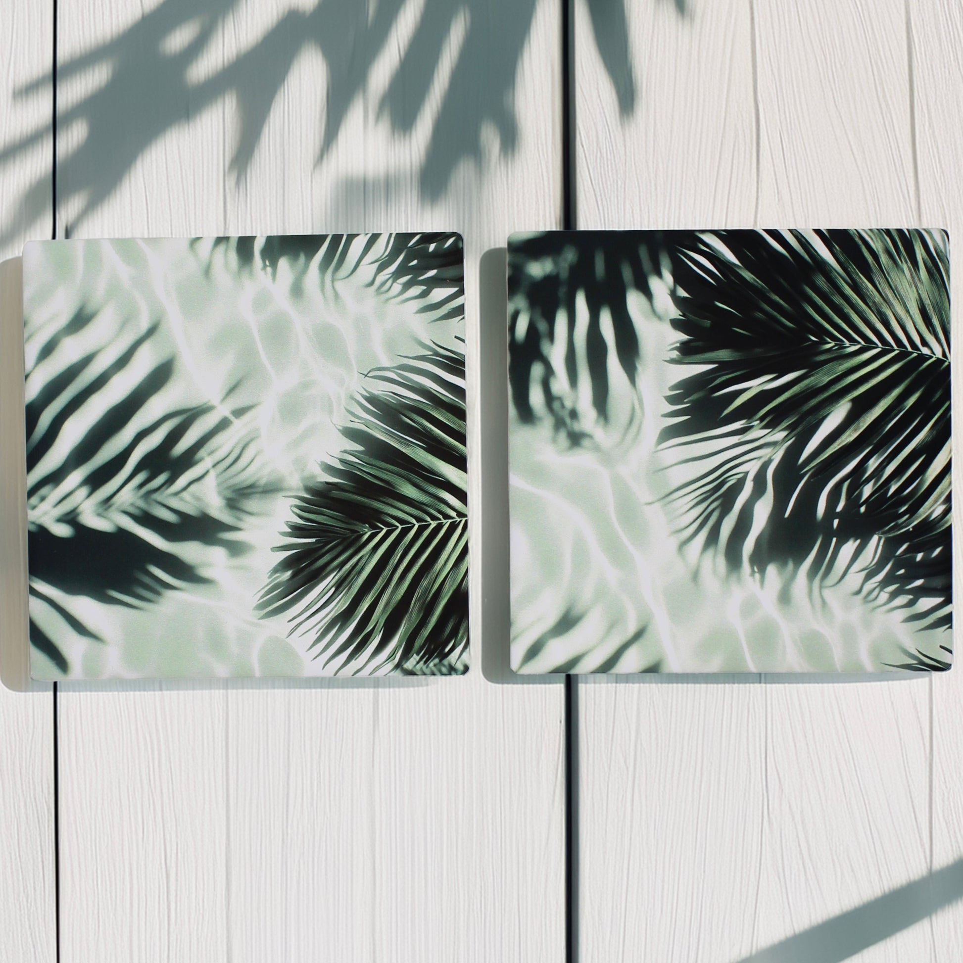 Bring a touch of the tropics to your space with our Jungle Leaf Pattern Ceramic Coaster Set. 

This set of four includes two variations of lush, leafy designs, offering a beautiful mix of botanical style, choose from green or pale grey option.

Available in matte or gloss finish to complement your style. 

Each coaster is finished with a crisp white, cork-backed base for both beauty and practicality.

10 x 10cm