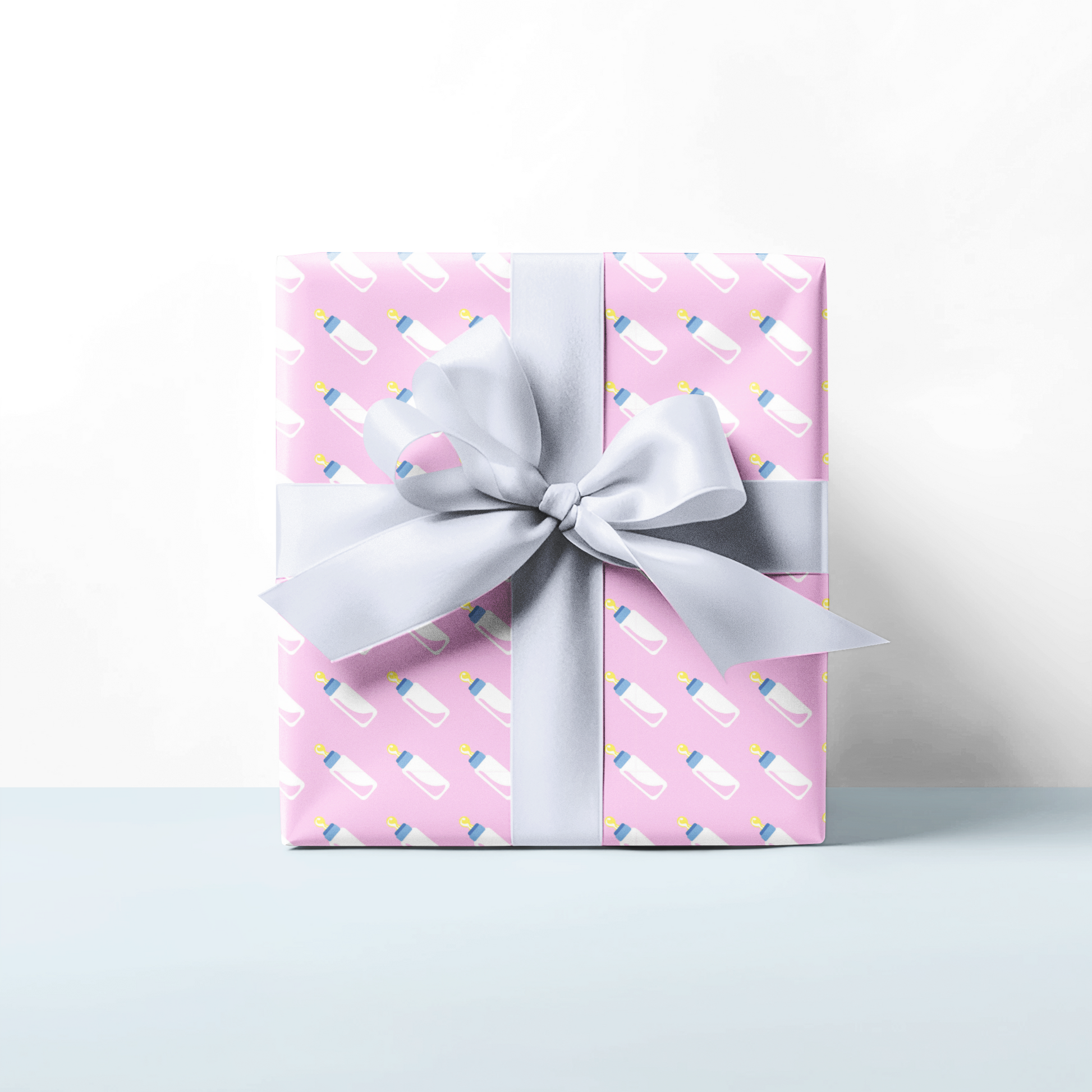 Gift box with pink pattern for new baby with baby bottle design