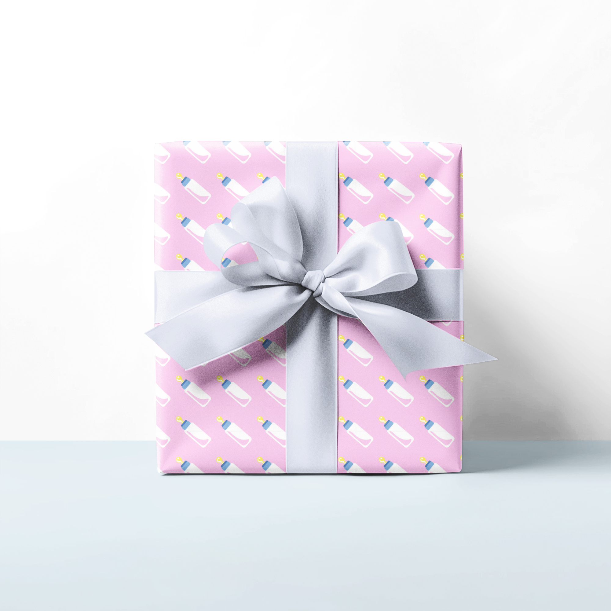 Gift box with pink pattern for new baby with baby bottle design