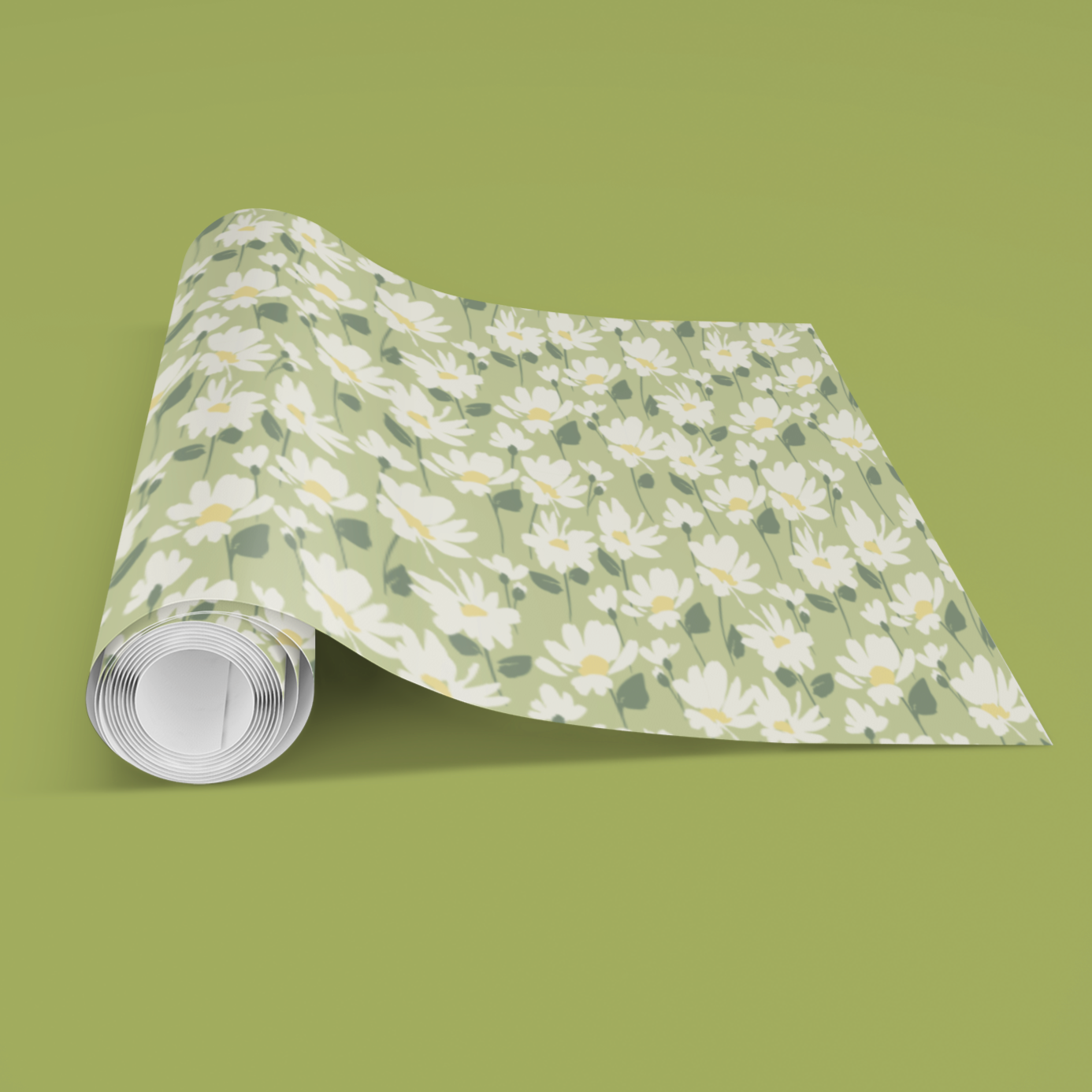 Roll of floral-patterned paper on a green background