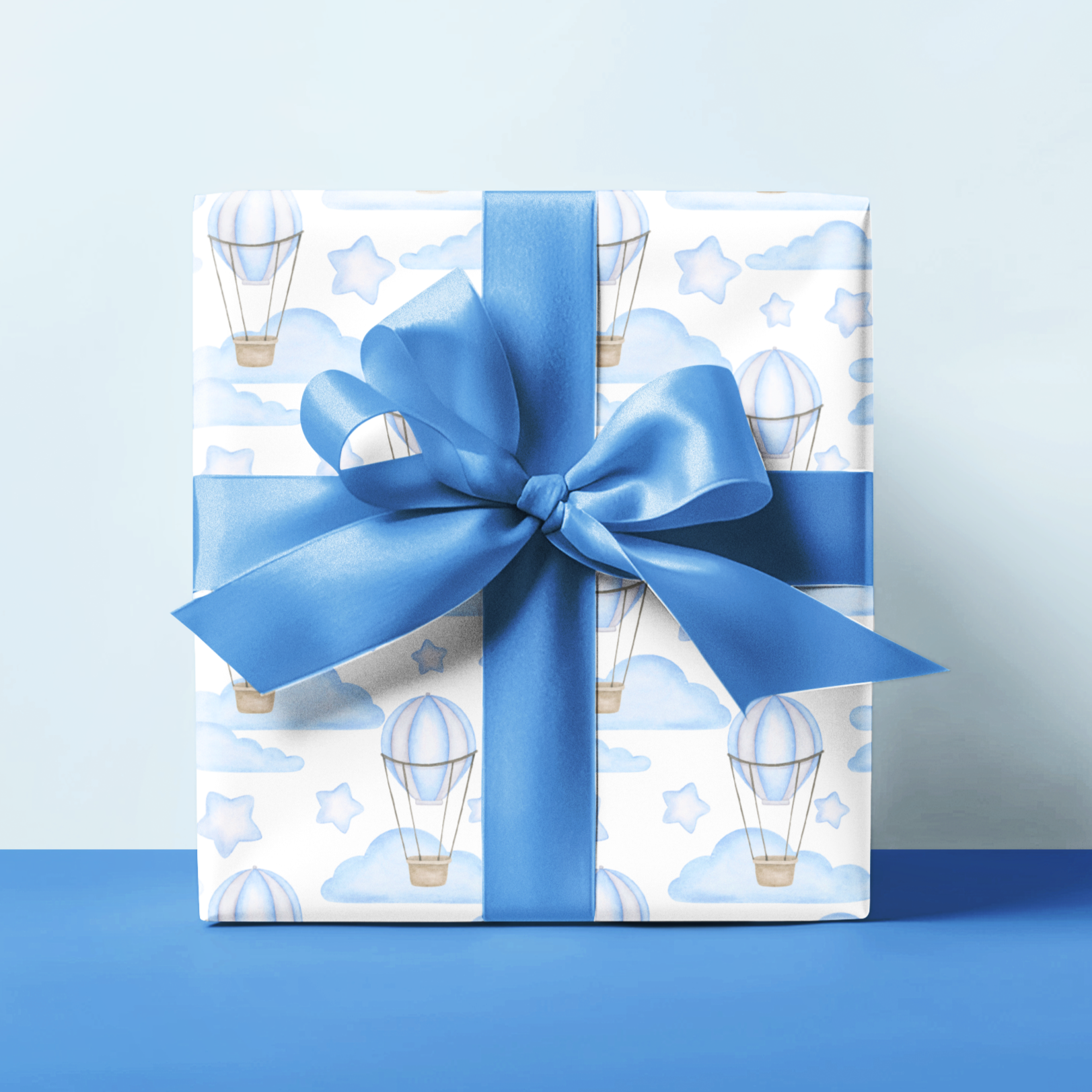 baby or young child gift wrapping paper design with blue hot air balloons