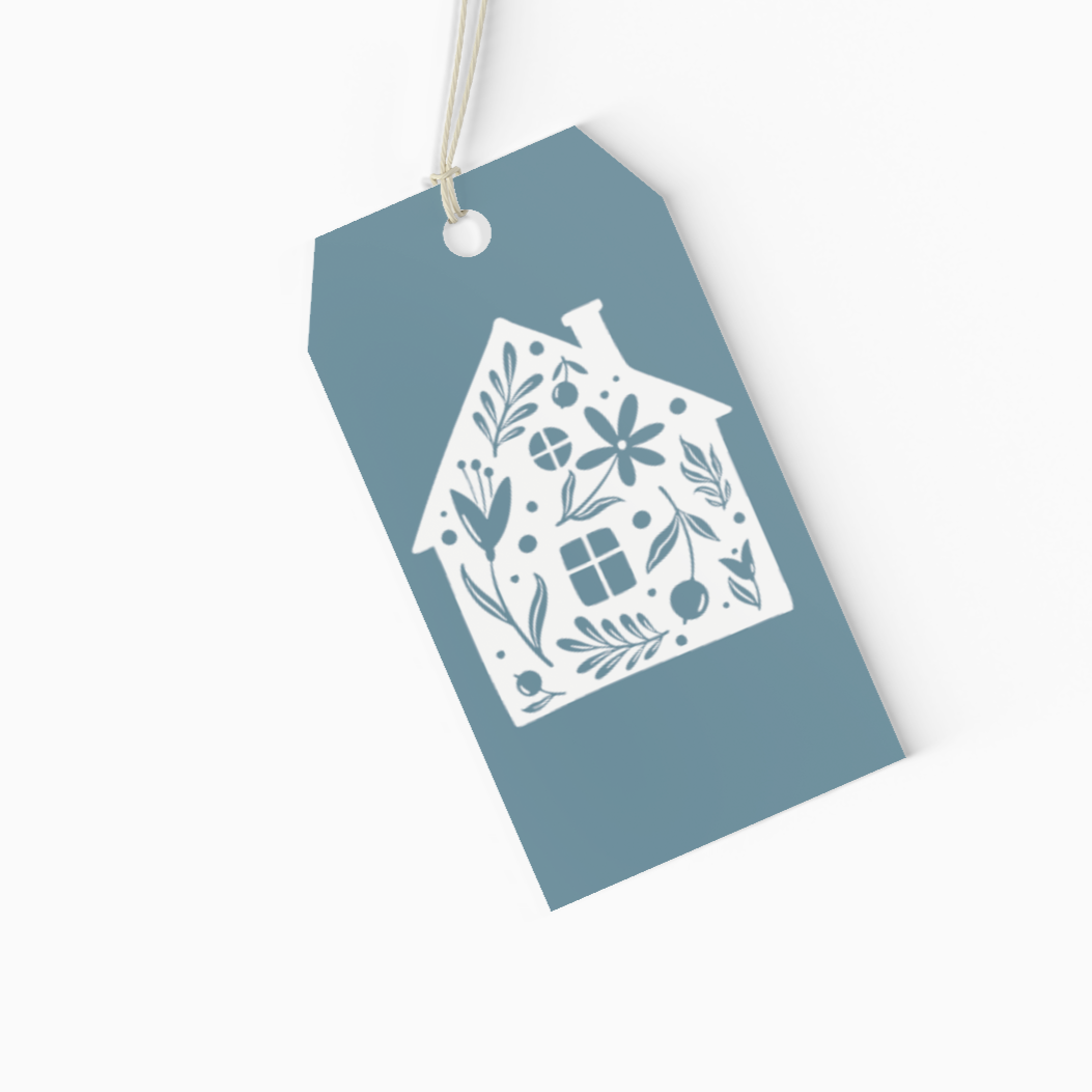 Blue gift tag with white house icon design