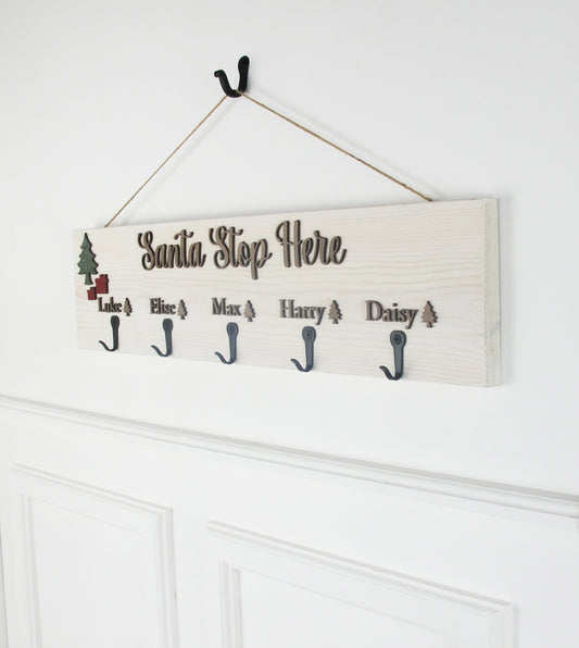 Festive Winter White Santa Stop Here Stocking hanger - Personalise with Family Names