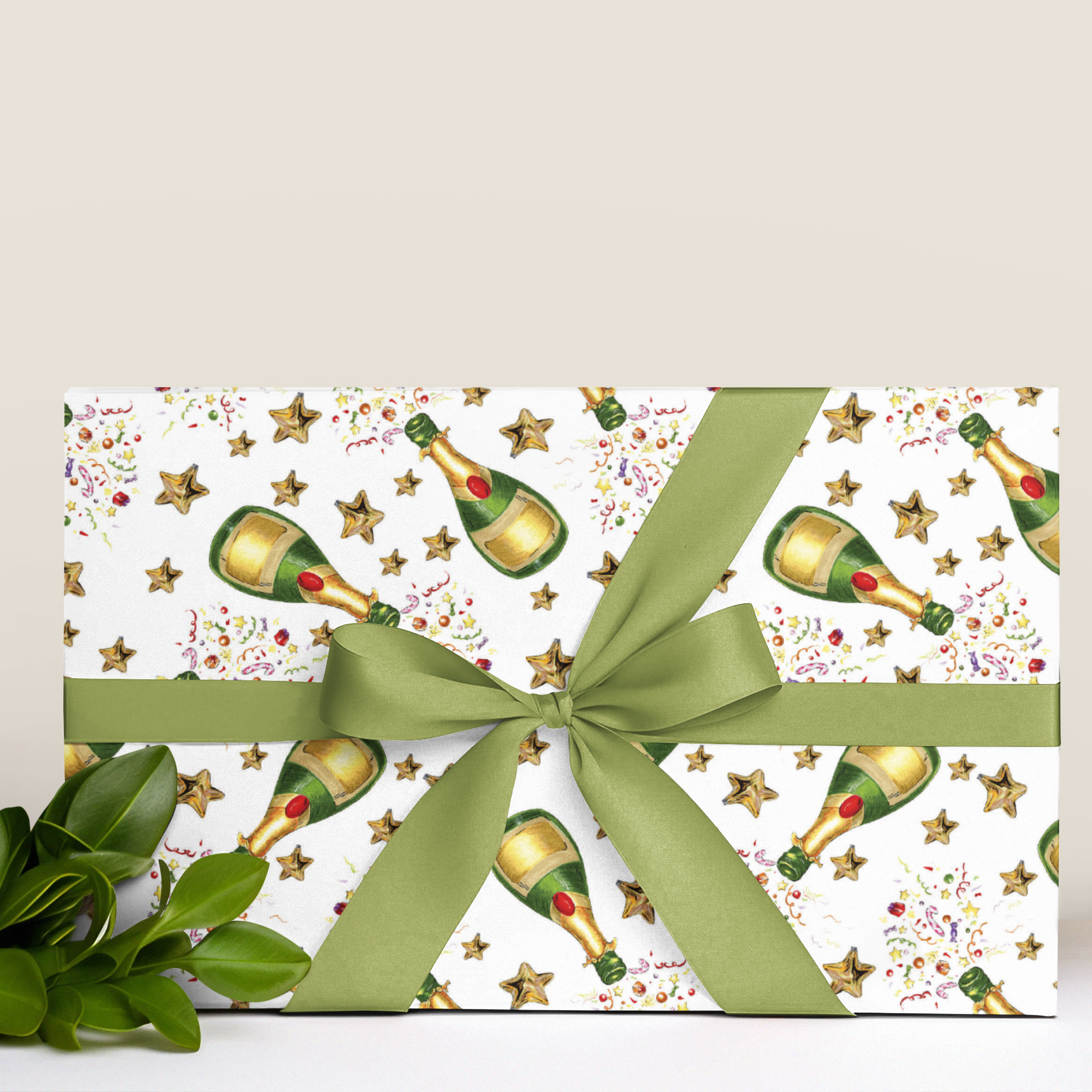 Gift box with champagne bottle pattern and green ribbon on a white background