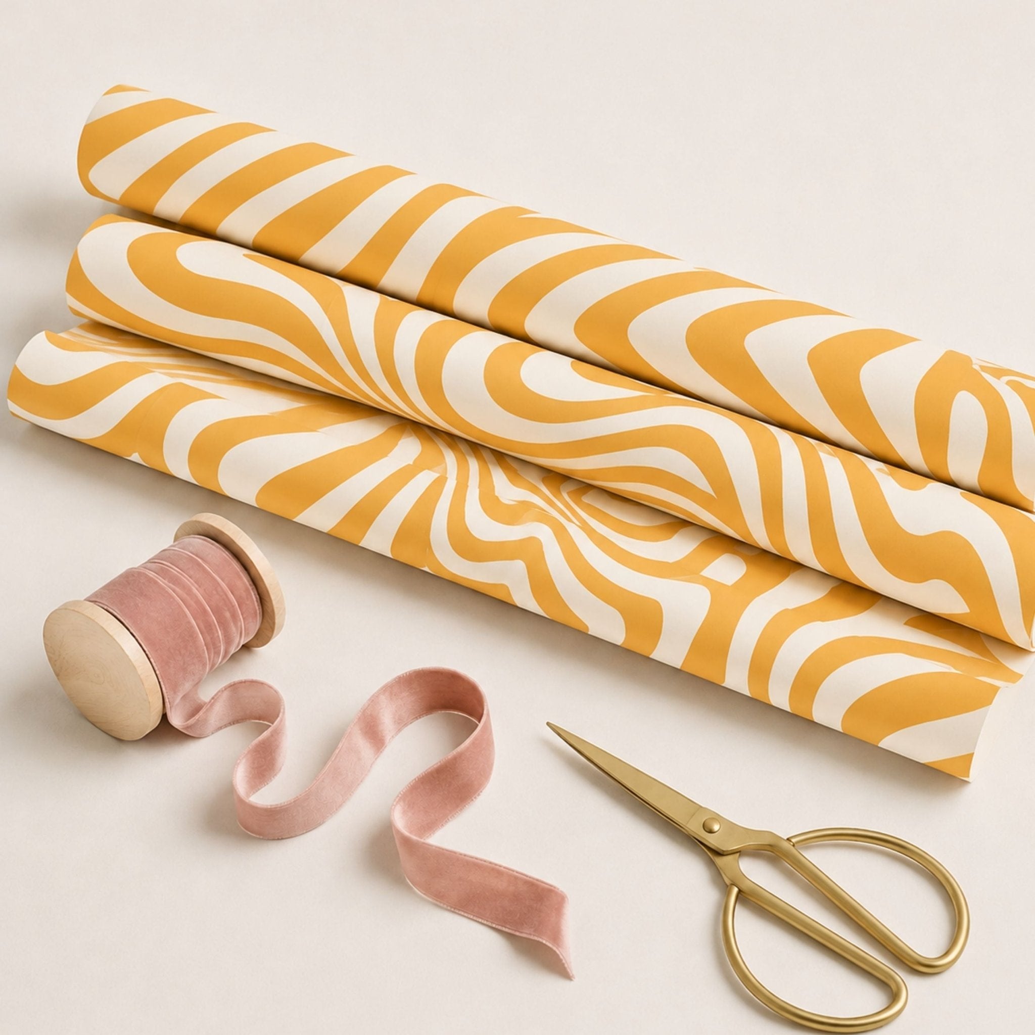 yellow Retro Swirl wrapping paper with ribbon and scissors